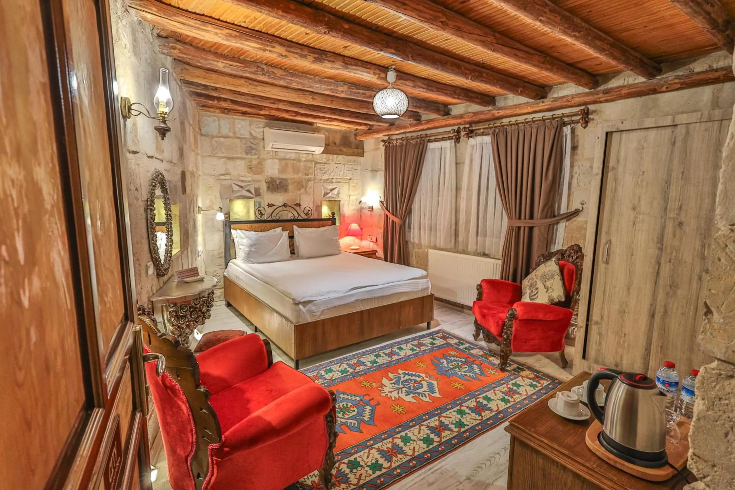 Bed in Bedrock Cave Hotel