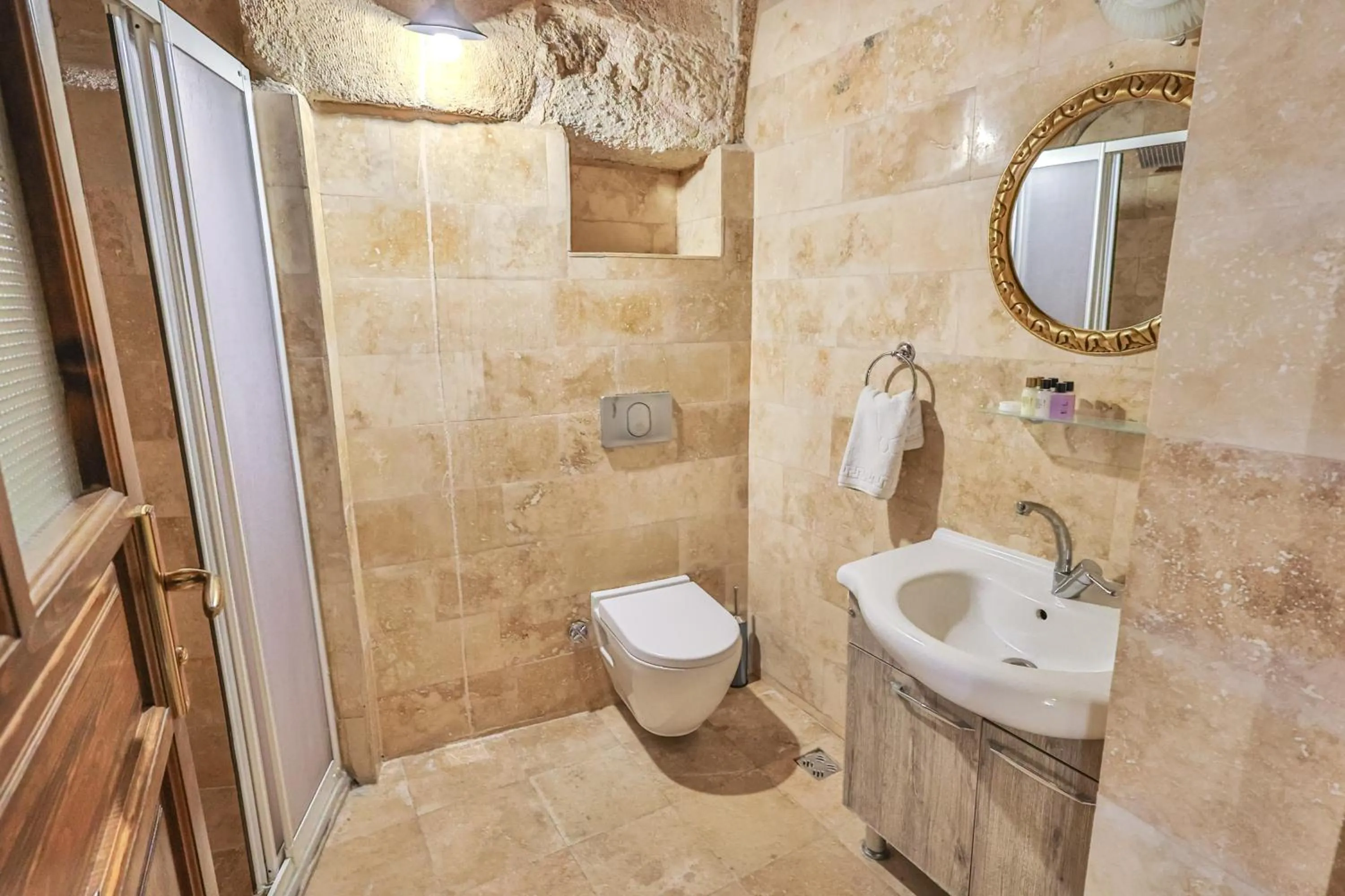 Shower in Bedrock Cave Hotel