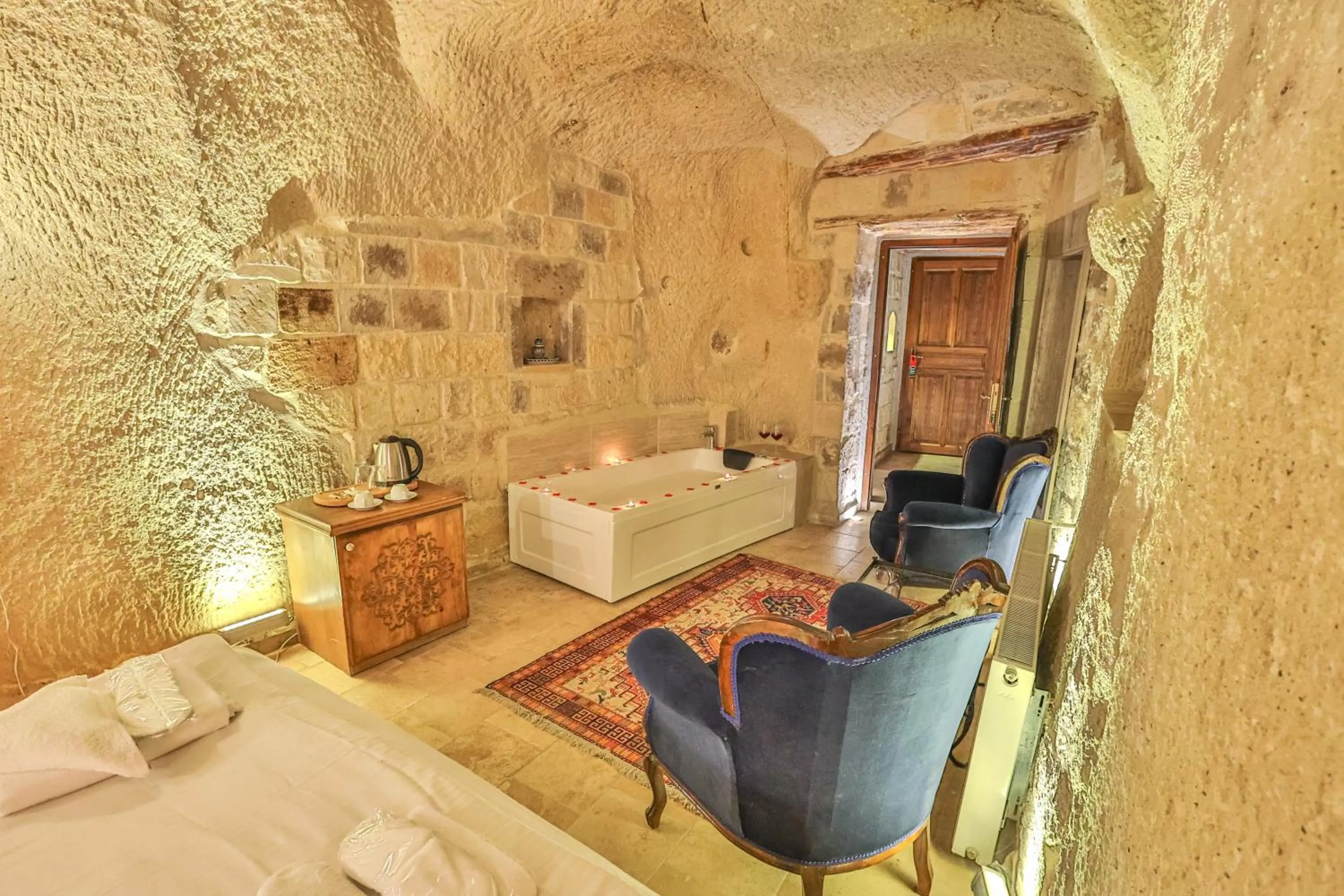 Bed in Bedrock Cave Hotel