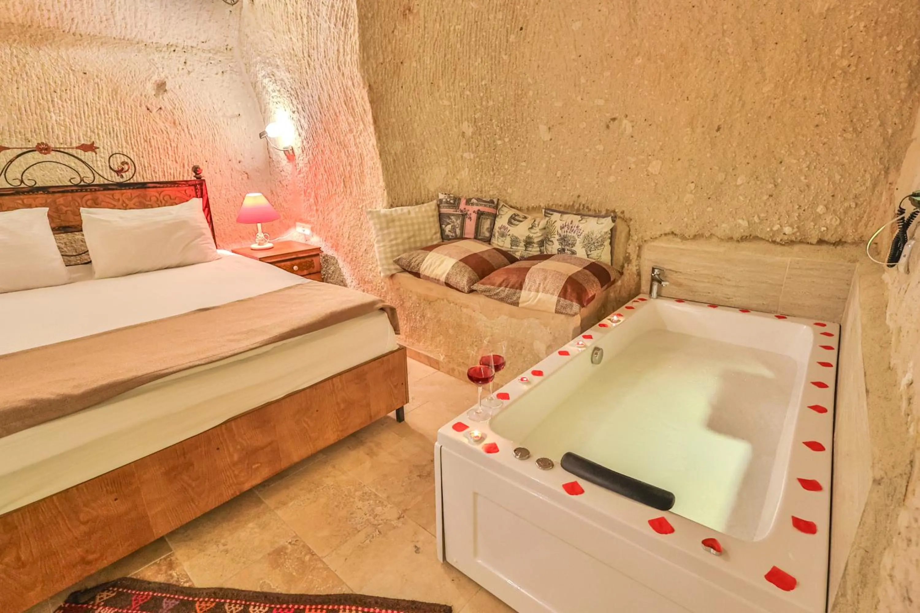 Bed in Bedrock Cave Hotel