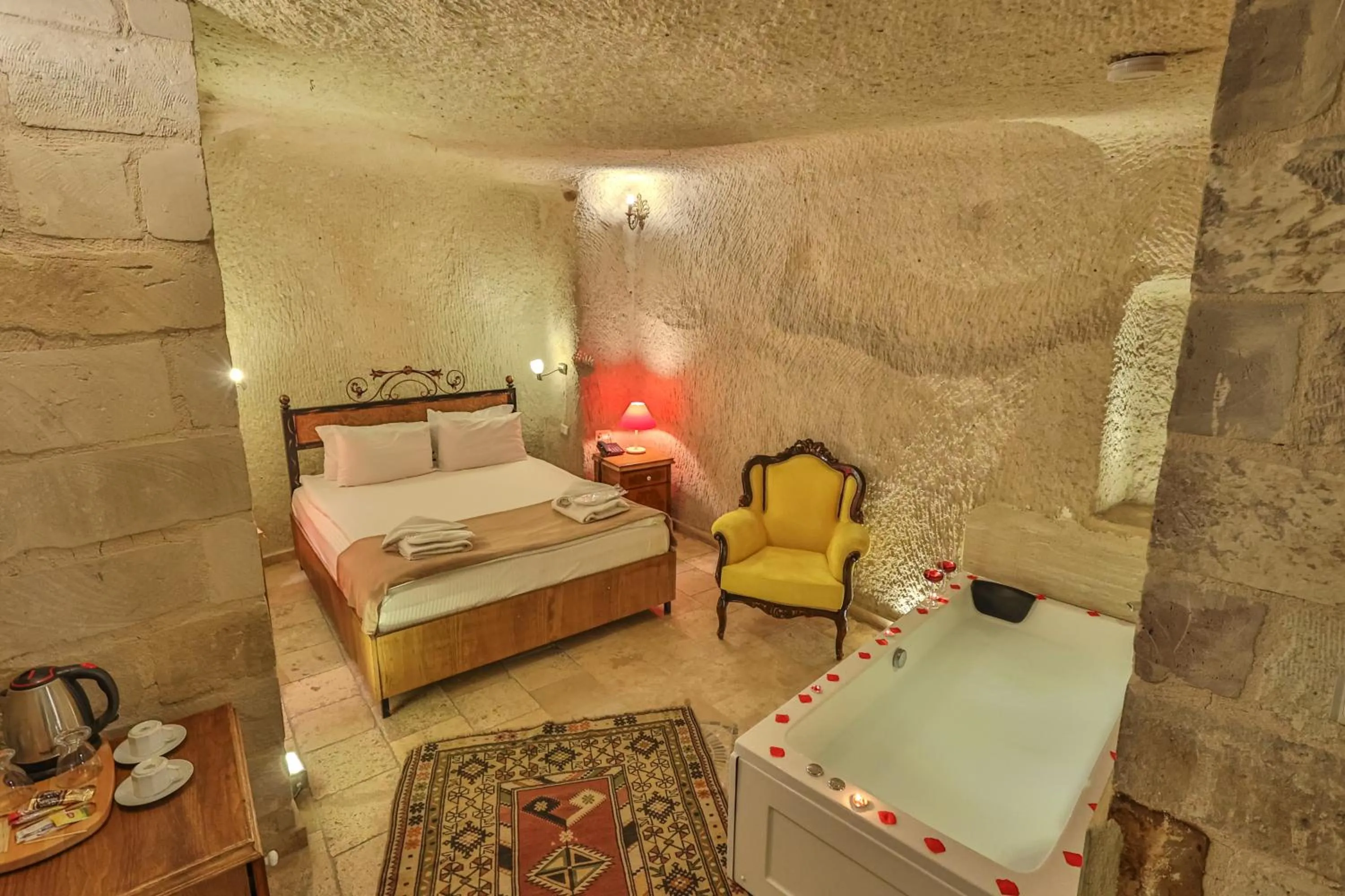 Bed in Bedrock Cave Hotel