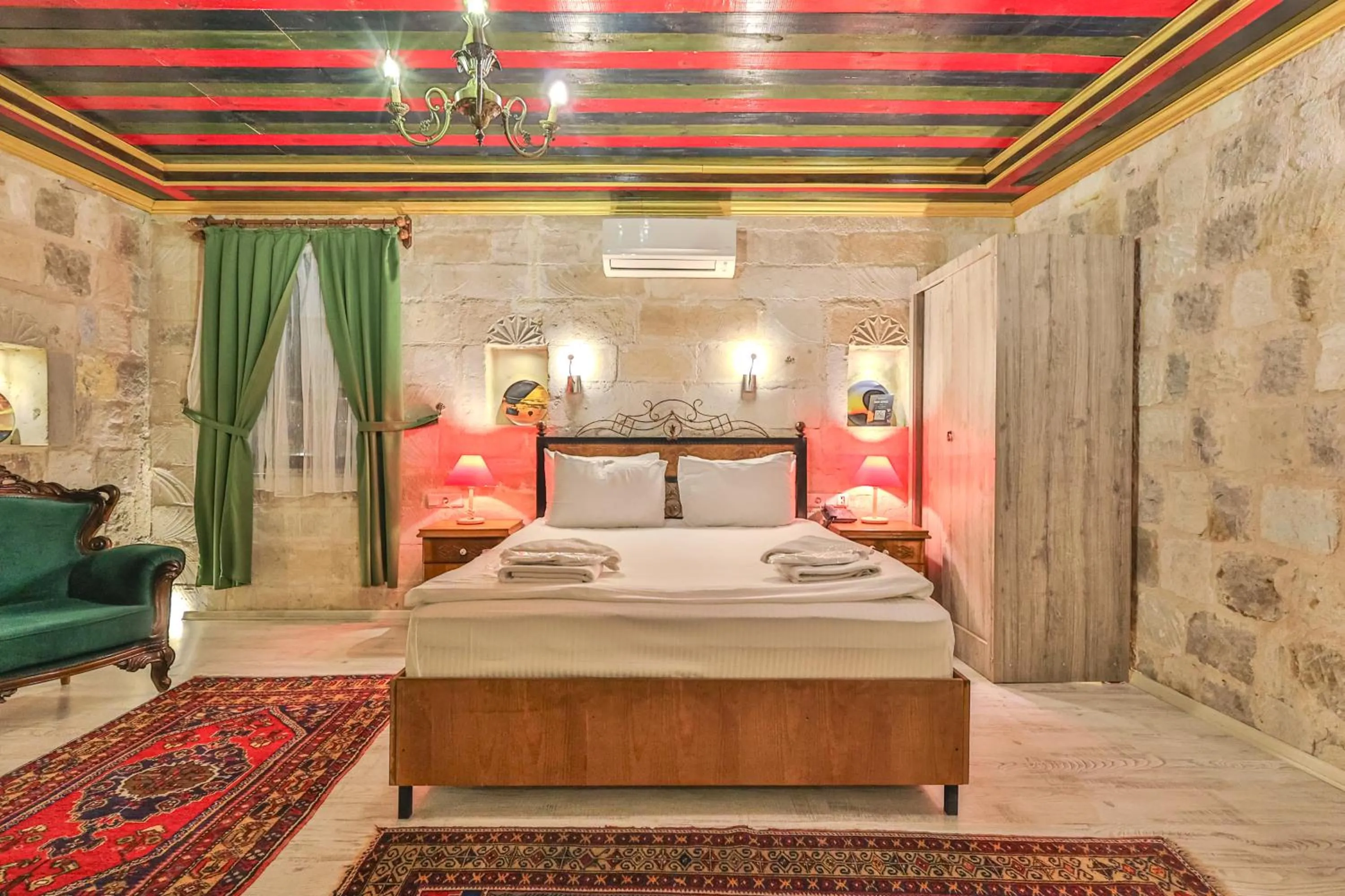 Bed in Bedrock Cave Hotel