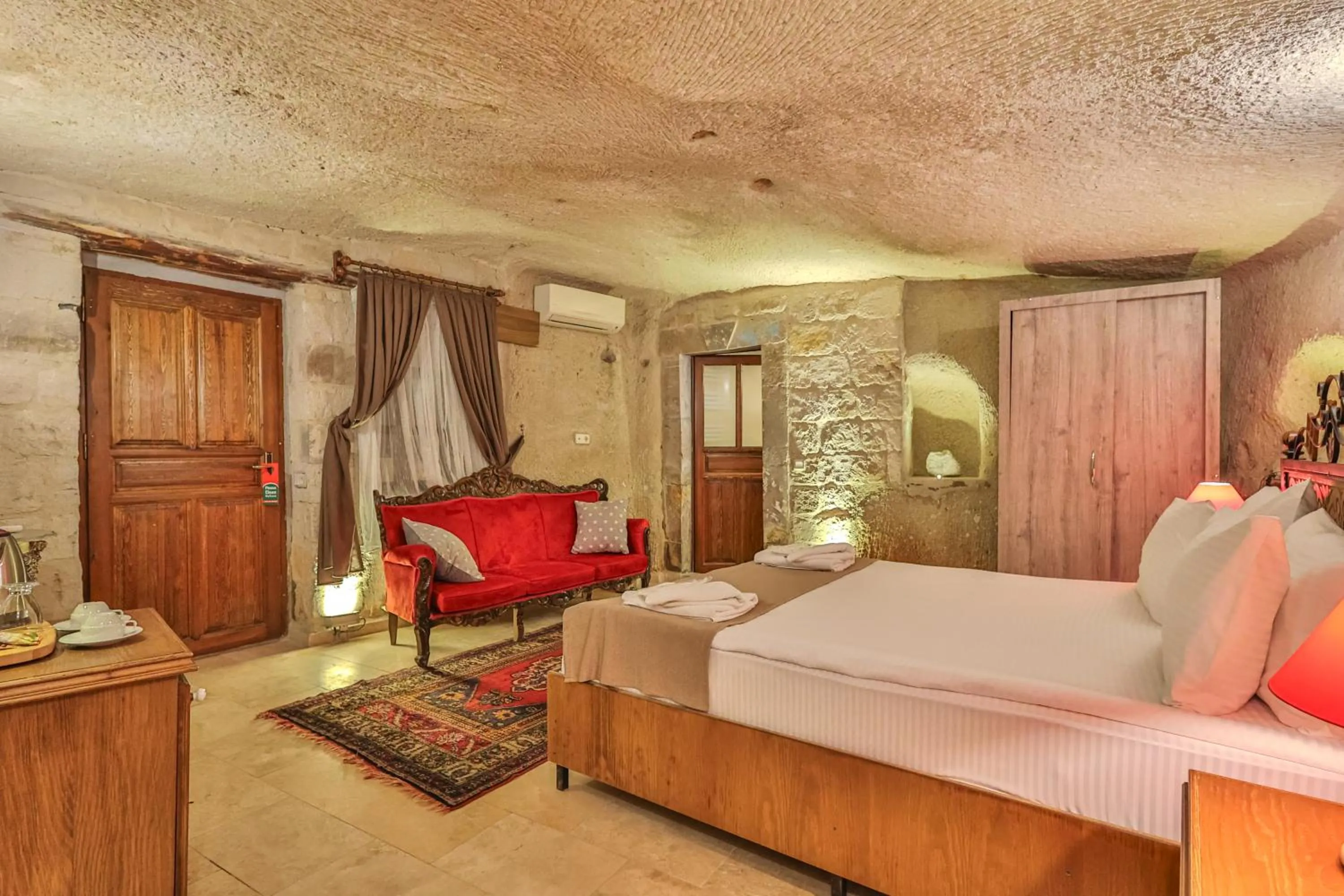 Bed in Bedrock Cave Hotel