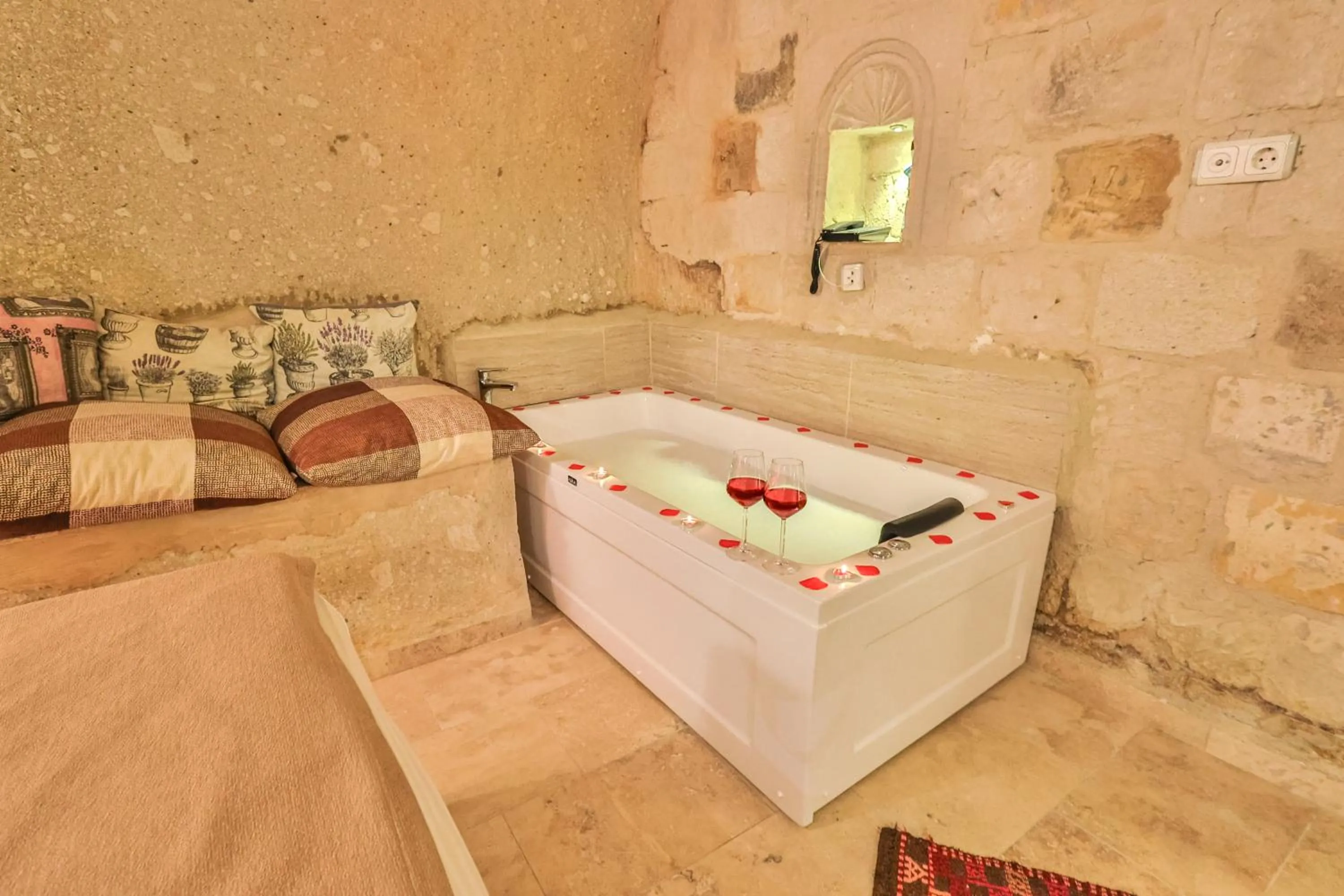 Bed in Bedrock Cave Hotel