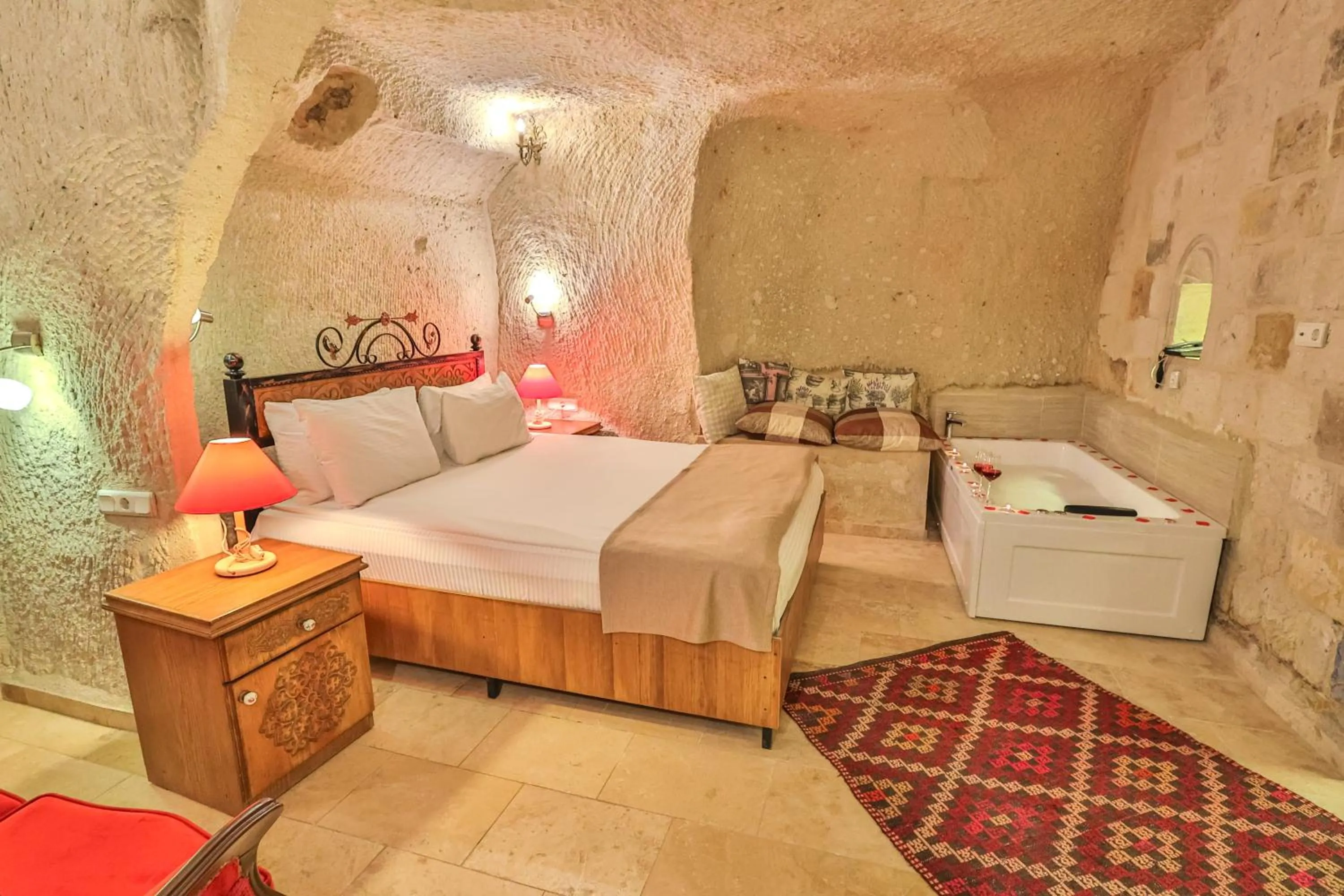 Bed in Bedrock Cave Hotel