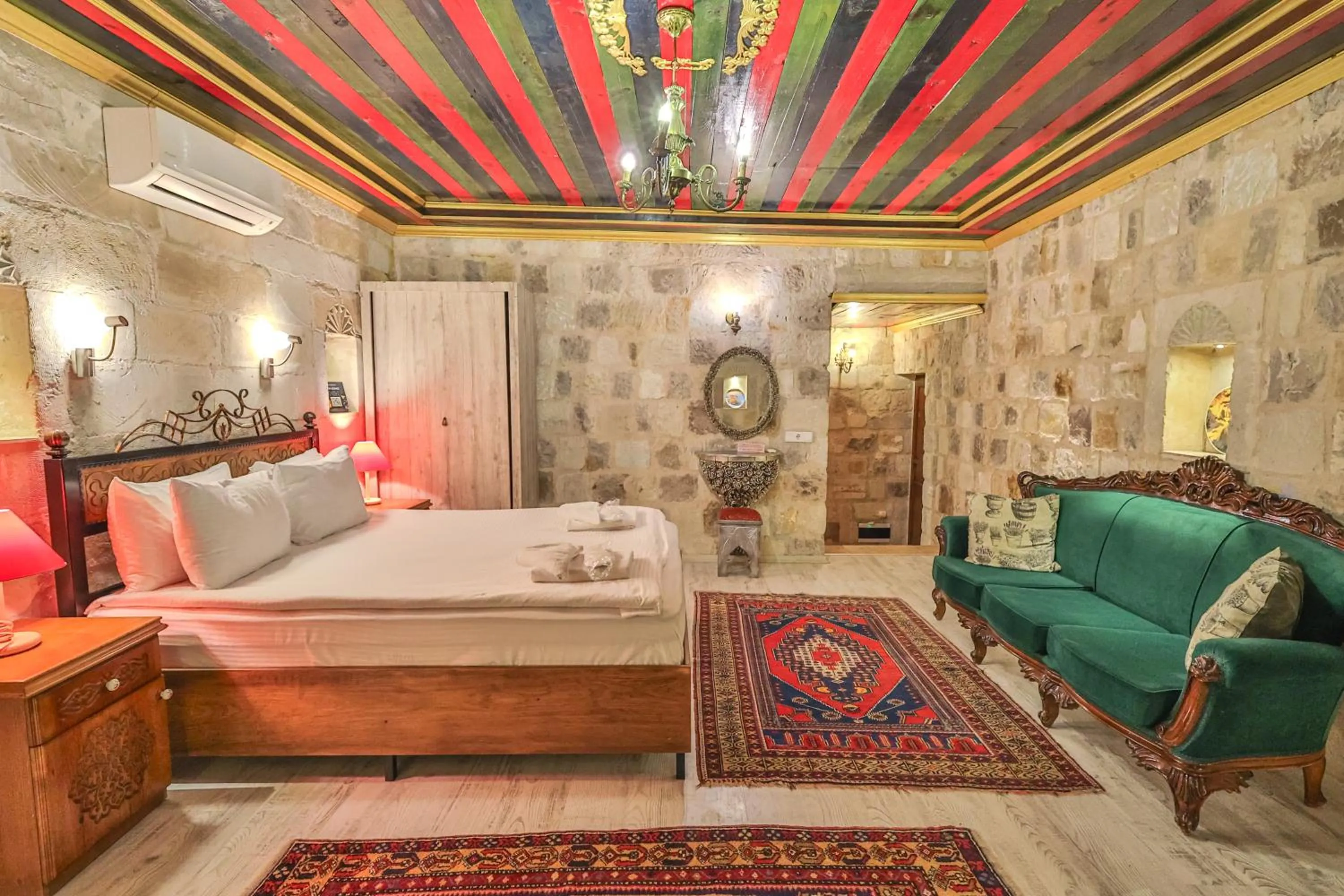 Bed in Bedrock Cave Hotel