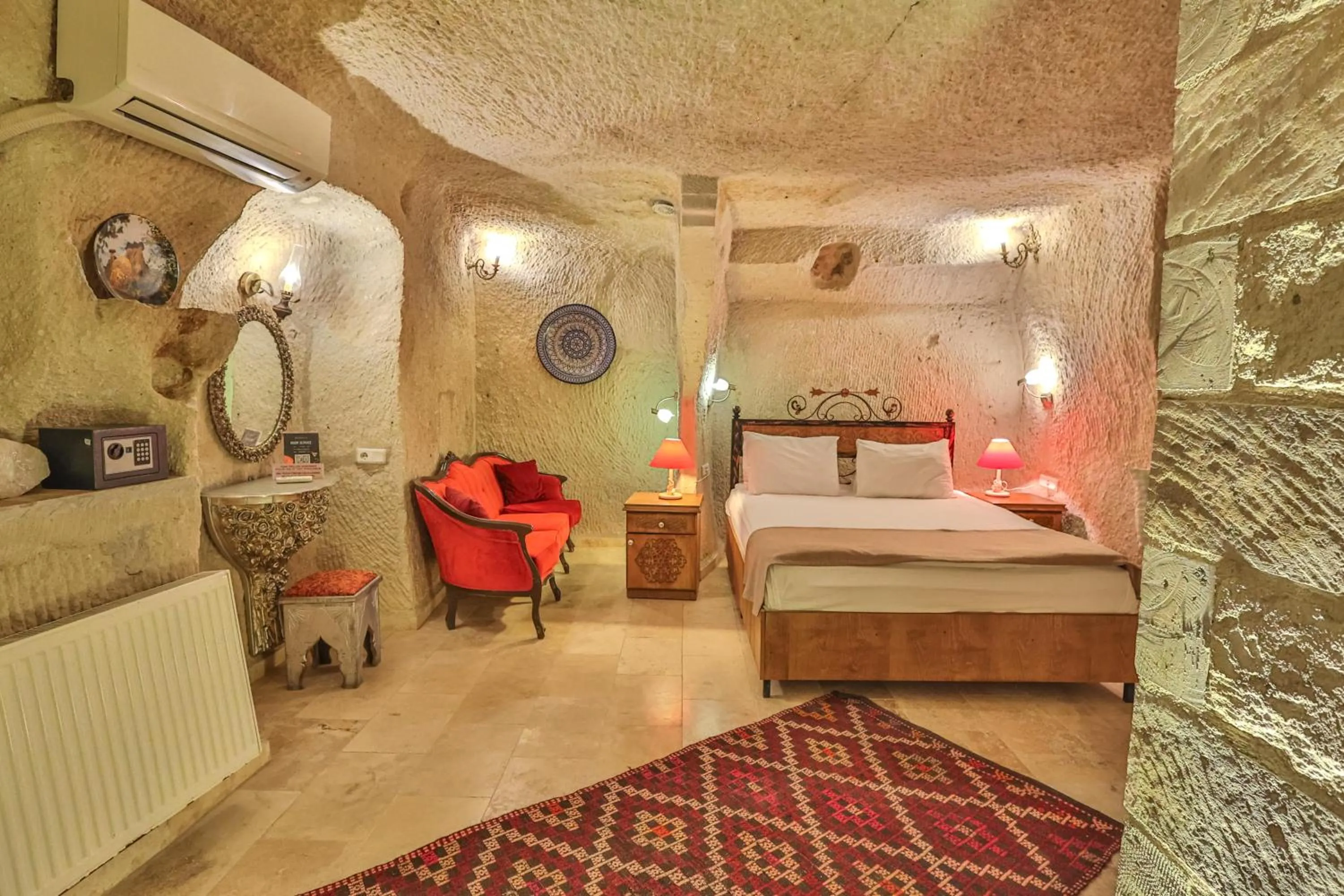 Bed in Bedrock Cave Hotel