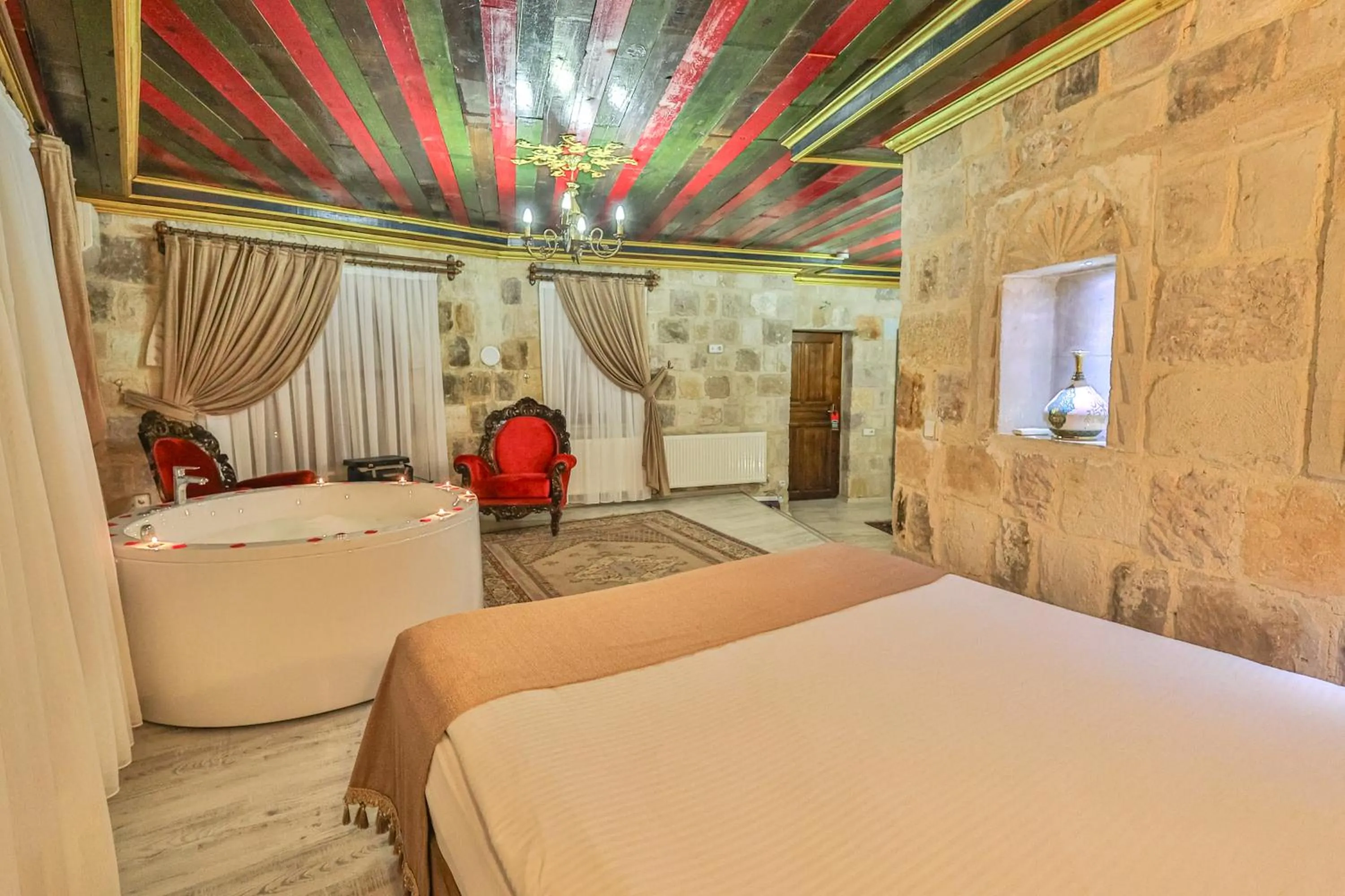 Bed in Bedrock Cave Hotel