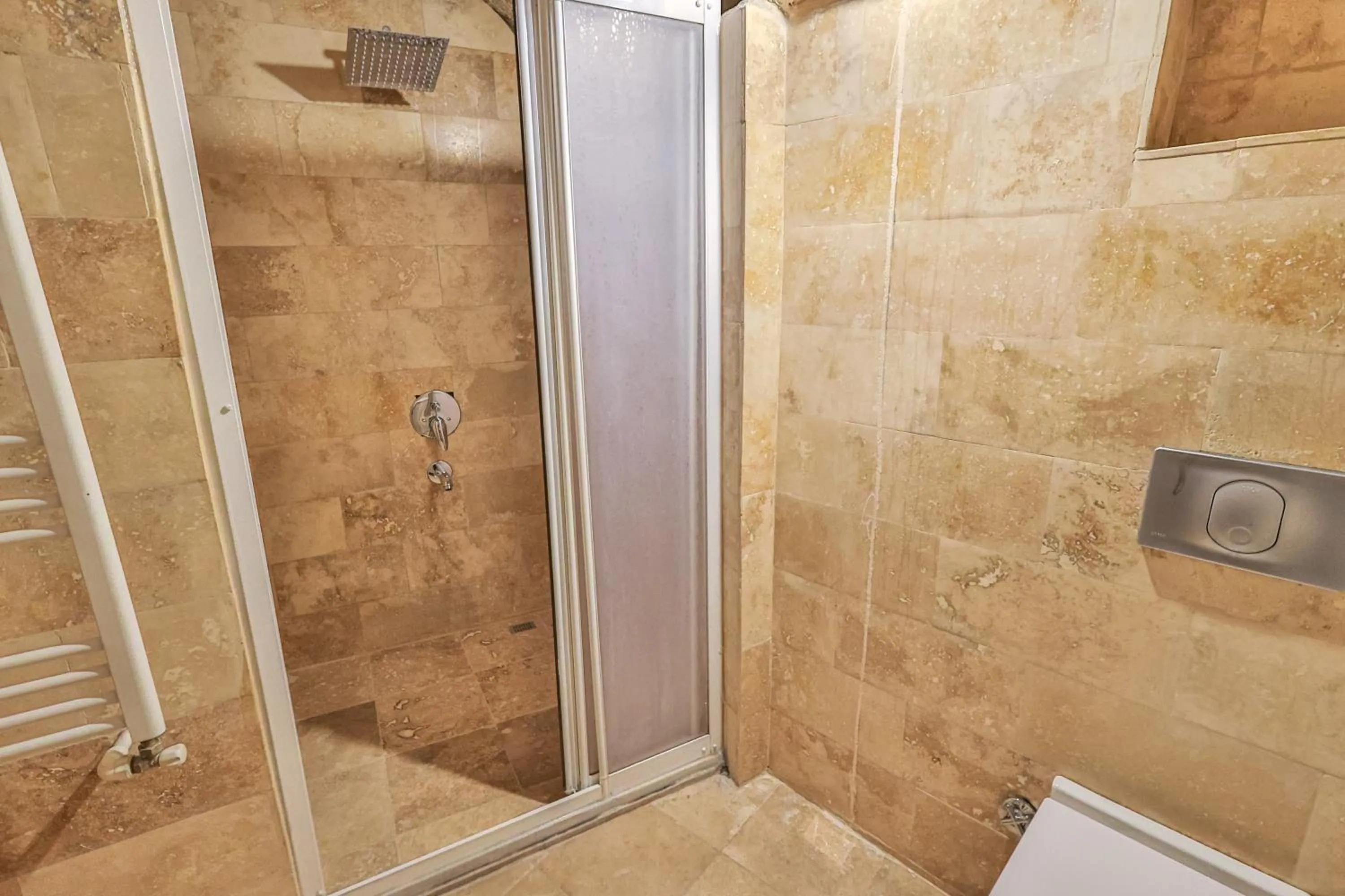 Shower in Bedrock Cave Hotel