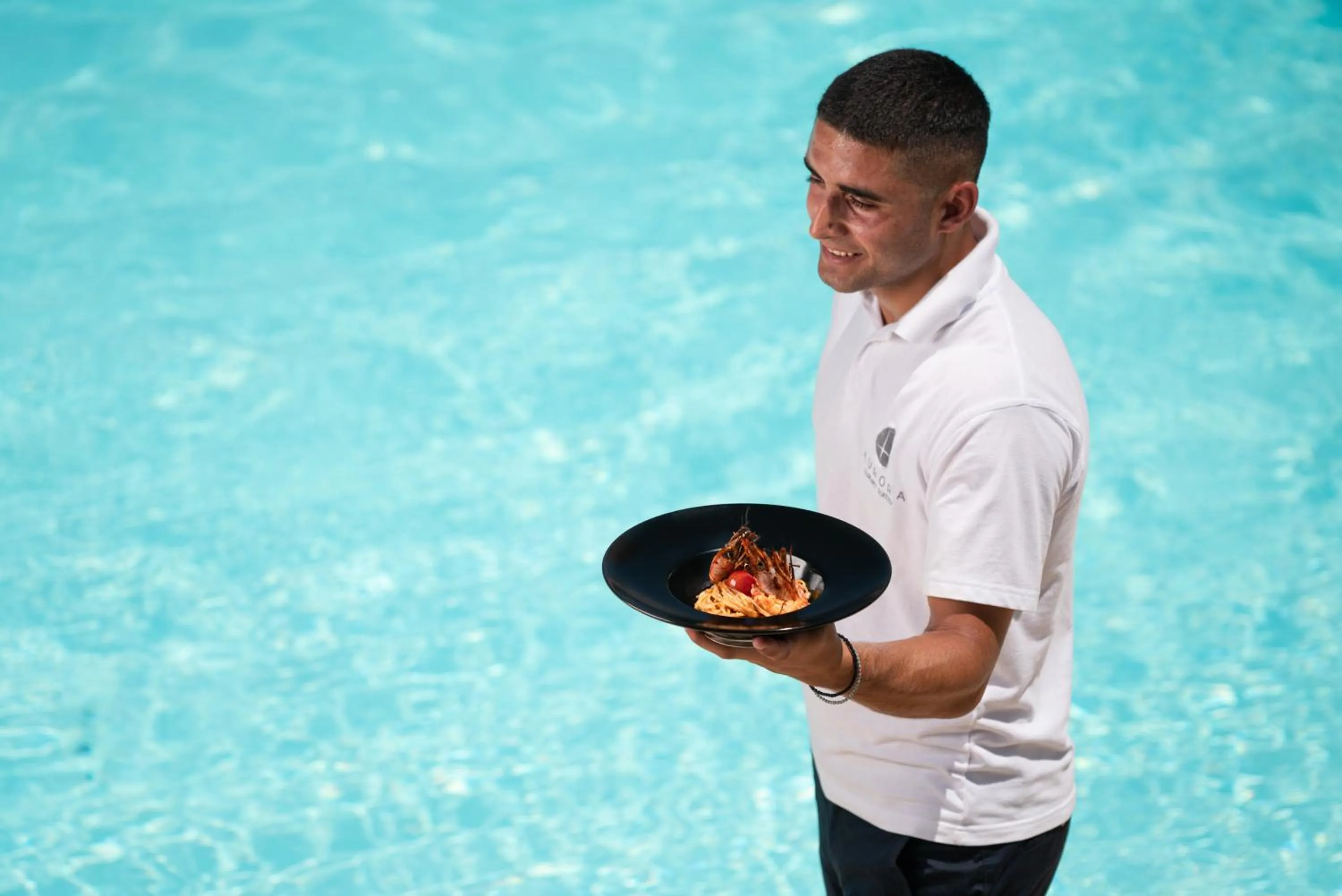 Staff in Aurora Santorini