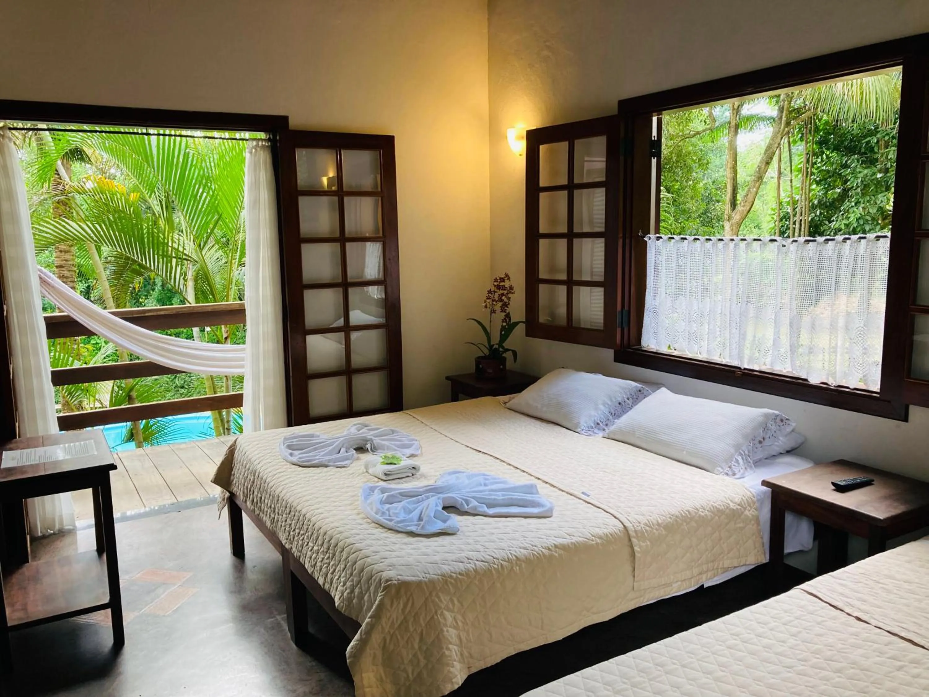 Bed in Pousada Rumo dos Ventos