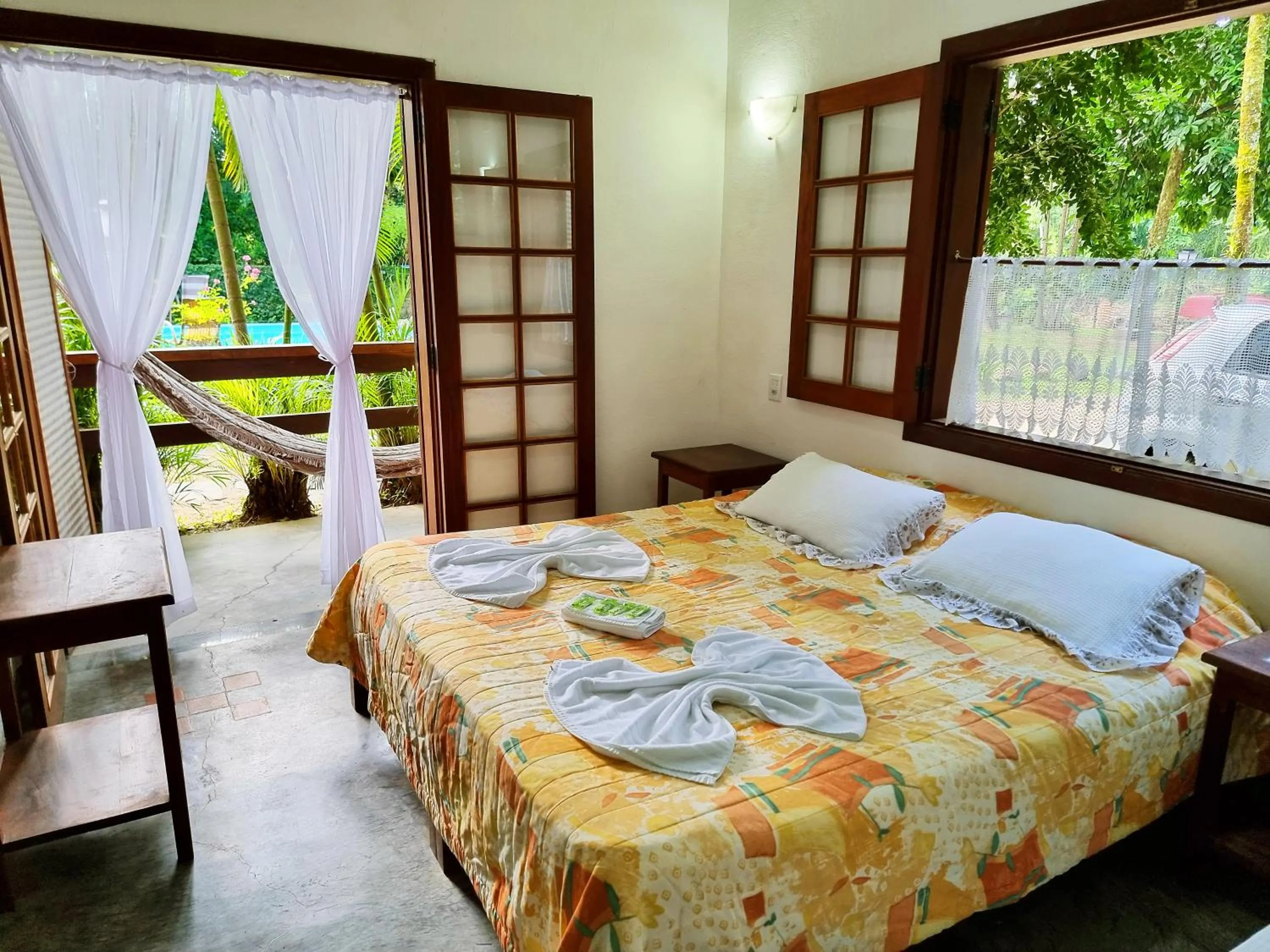 Bed in Pousada Rumo dos Ventos