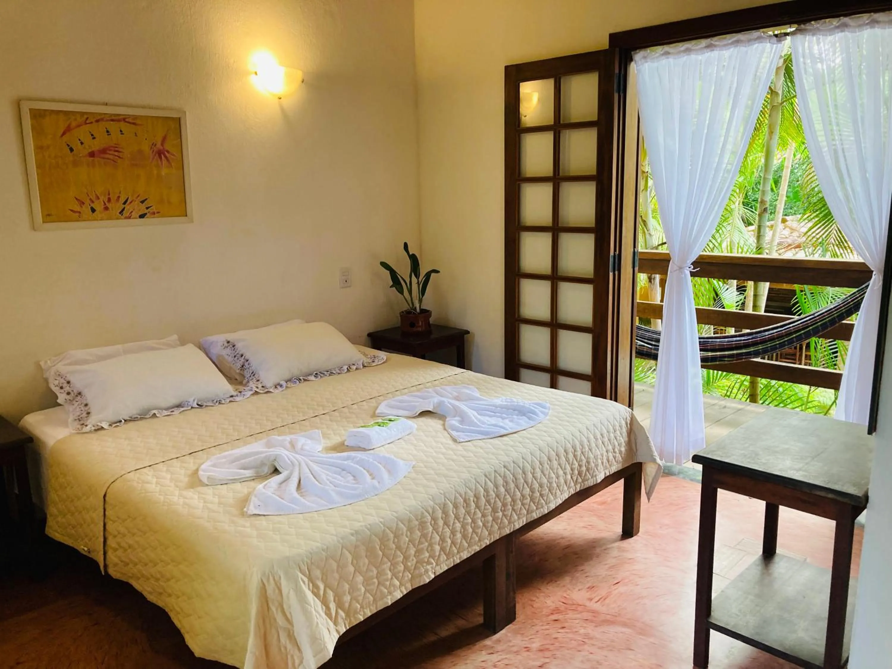 Bed in Pousada Rumo dos Ventos