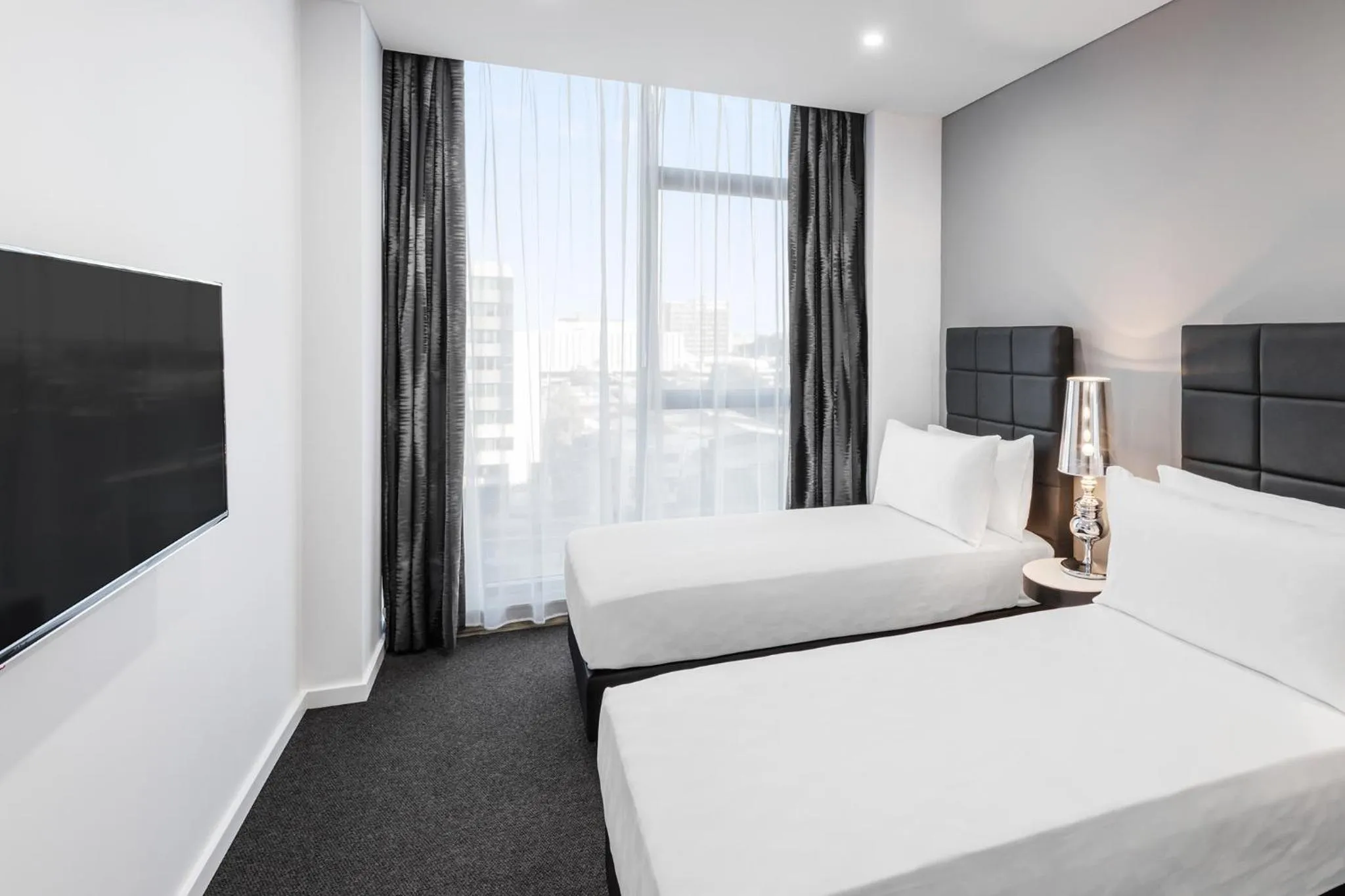 Bed in Meriton Suites Mascot Central