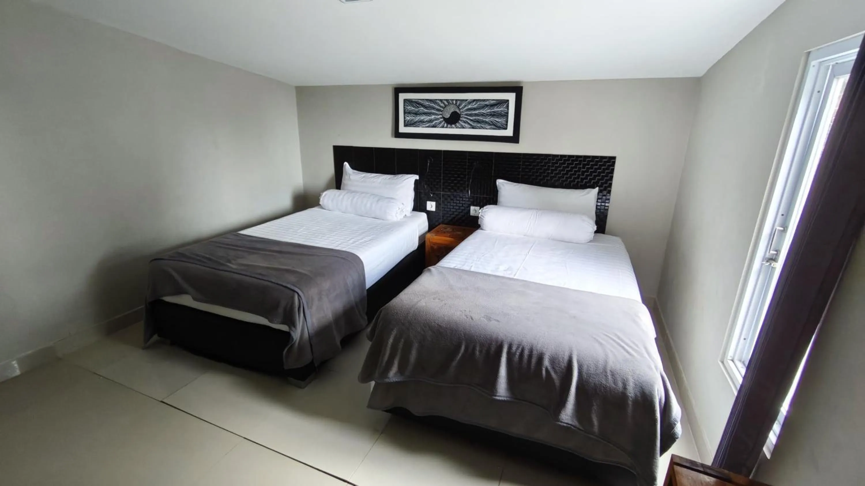 Bed in Silver Fern Beach Retreat
