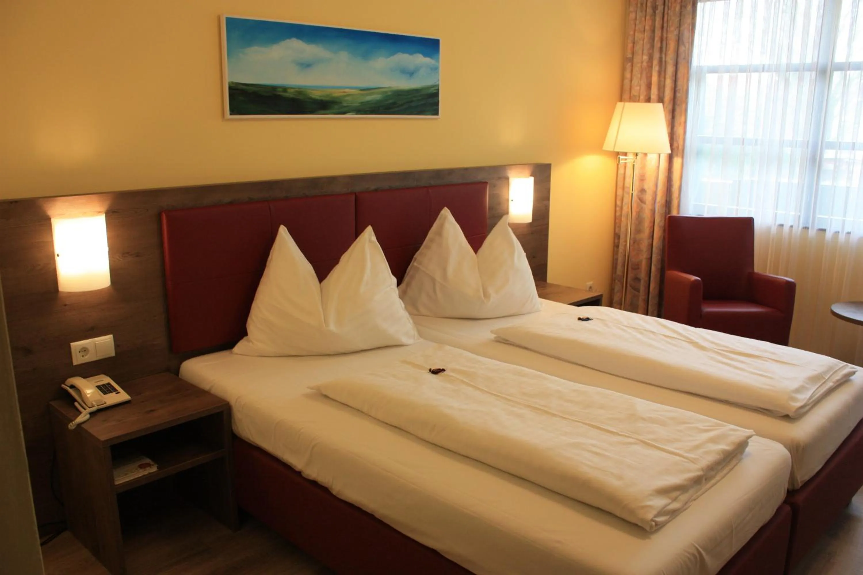 Photo of the whole room, Bed in Burgenländerhof Hotel Garni