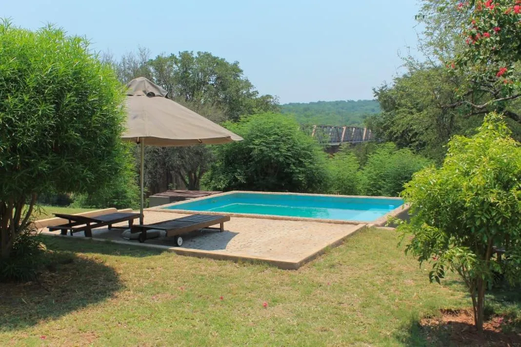 Swimming pool in Three Bridges B&B