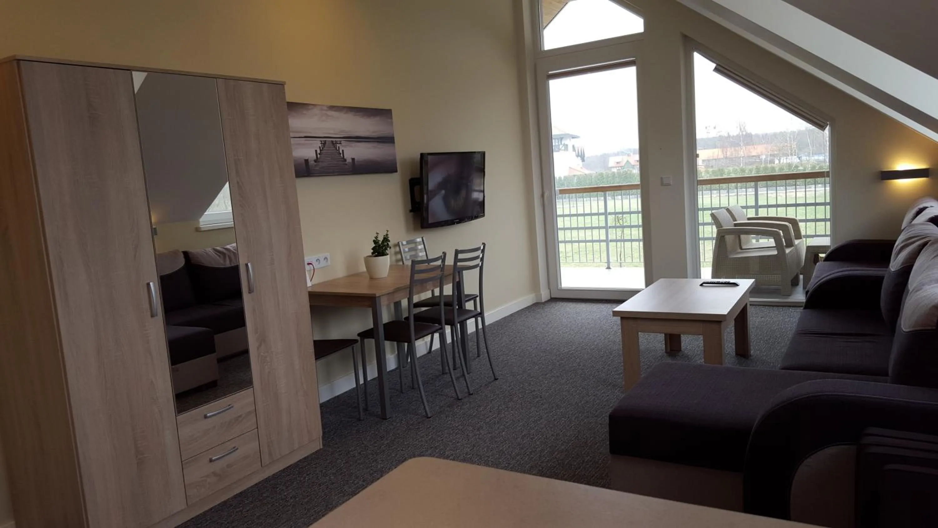 Photo of the whole room in Aparthotel EuforiaPort