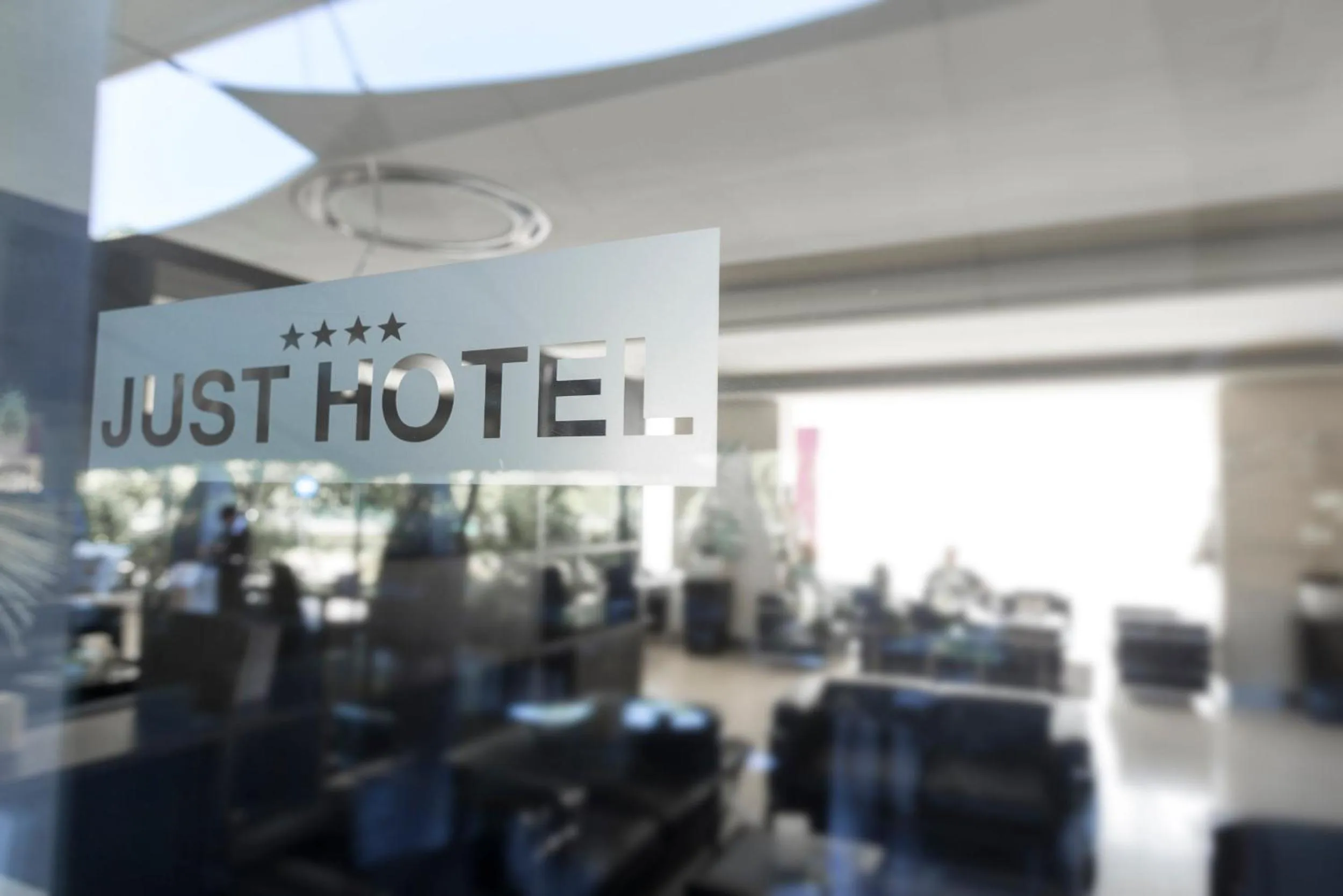 Property logo or sign in Just Hotel Lomazzo Fiera