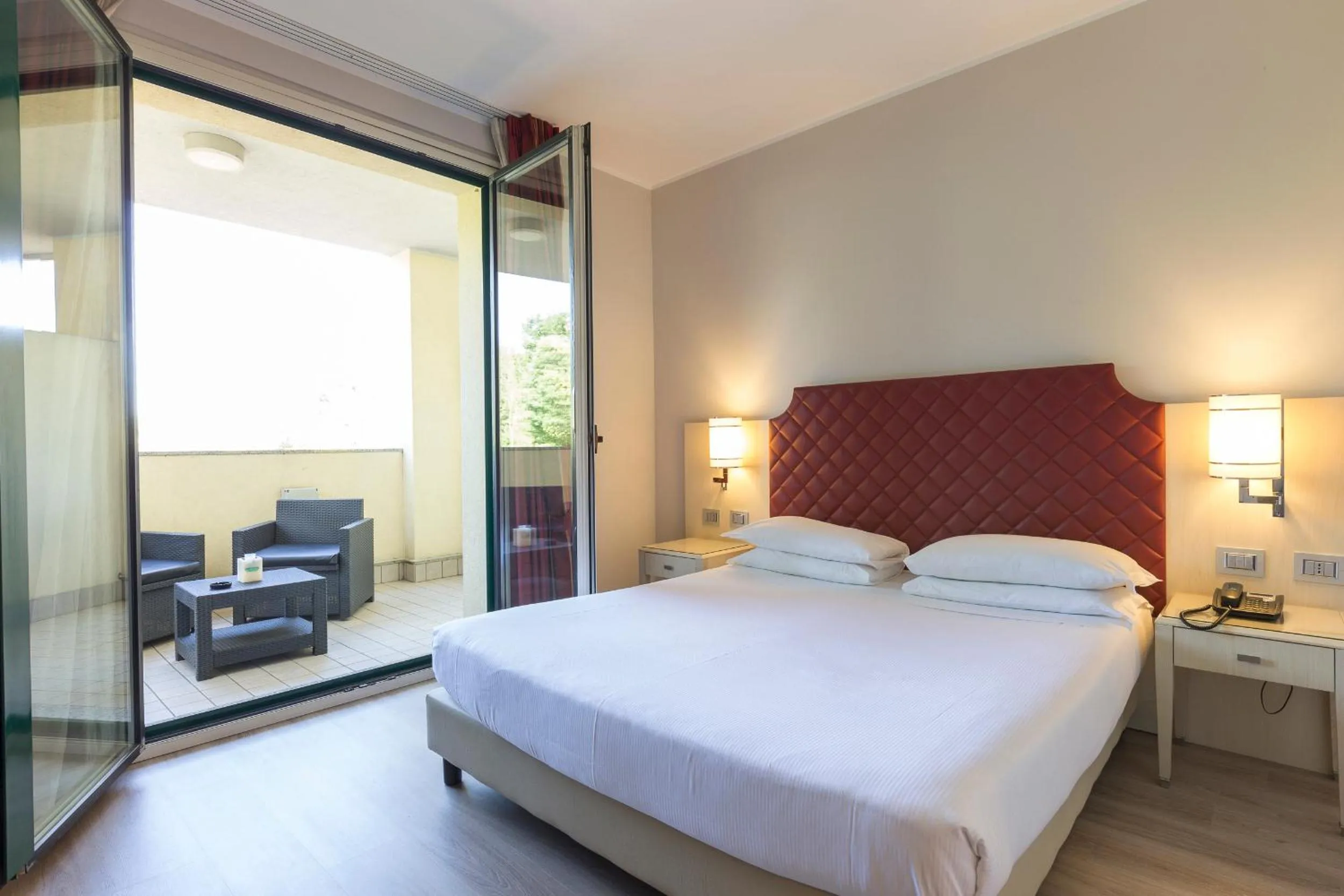 Balcony/Terrace, Bed in Just Hotel Lomazzo Fiera