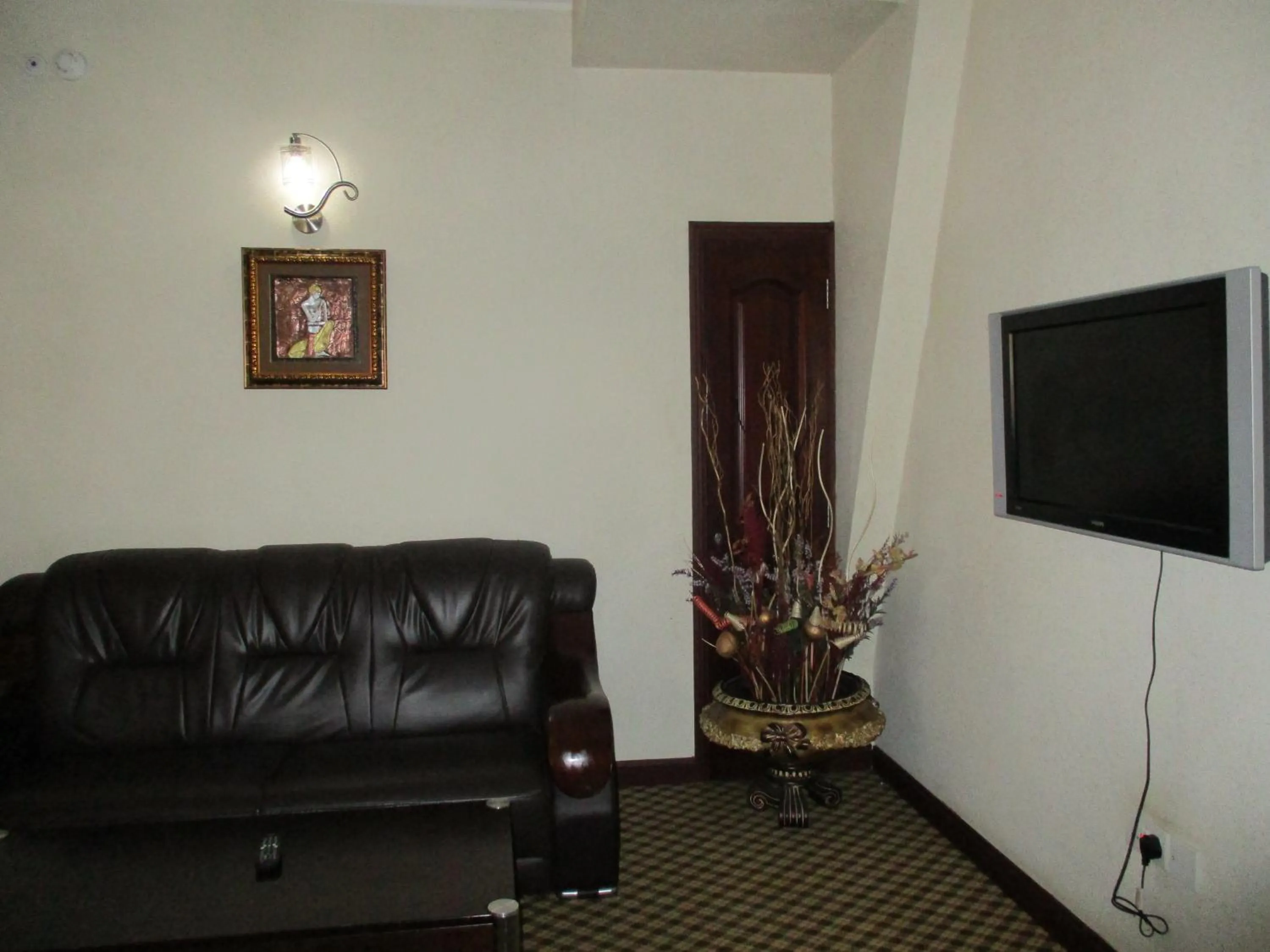Communal lounge/ TV room in Imperial Royale Hotel