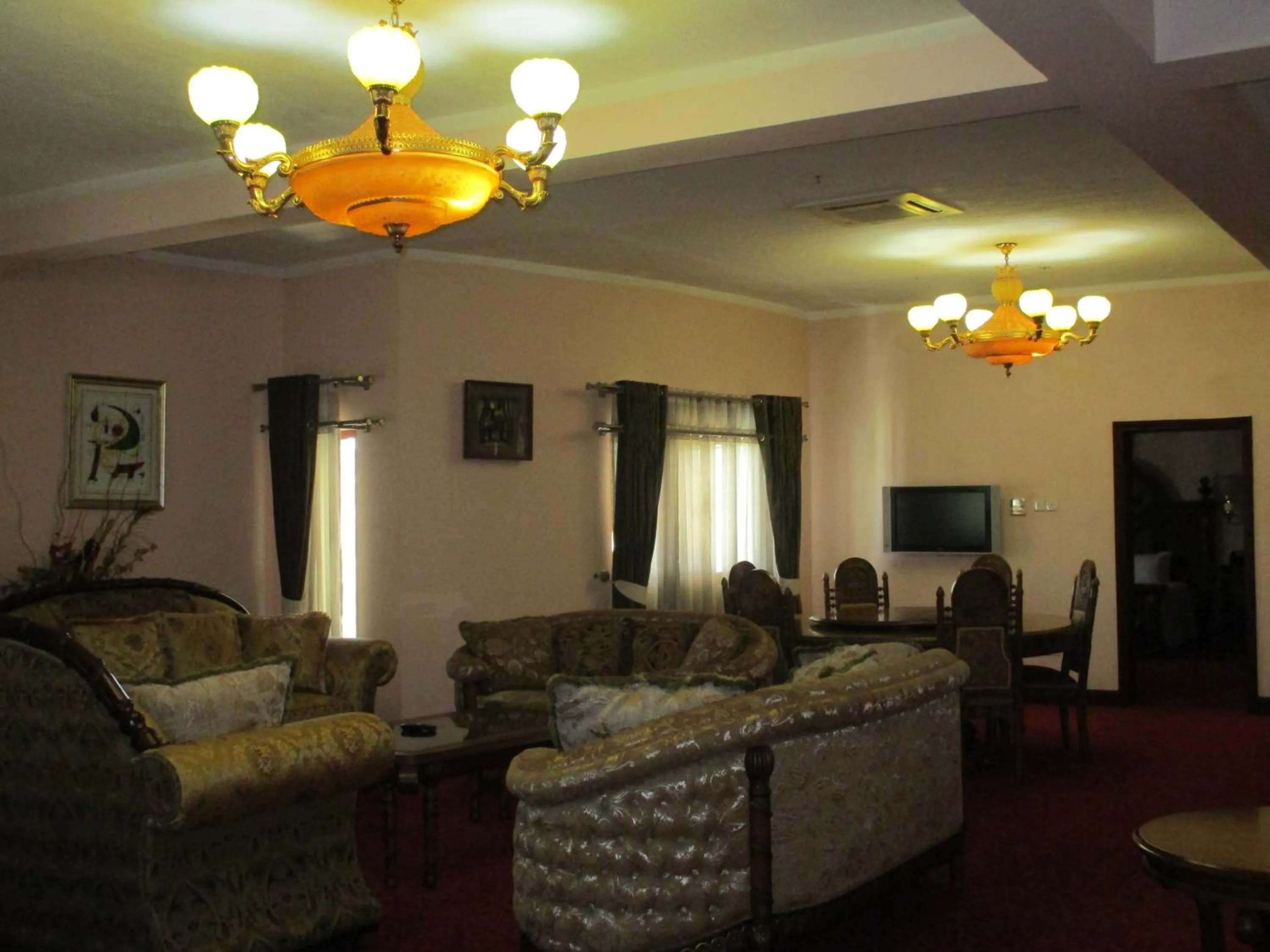 Communal lounge/ TV room in Imperial Royale Hotel