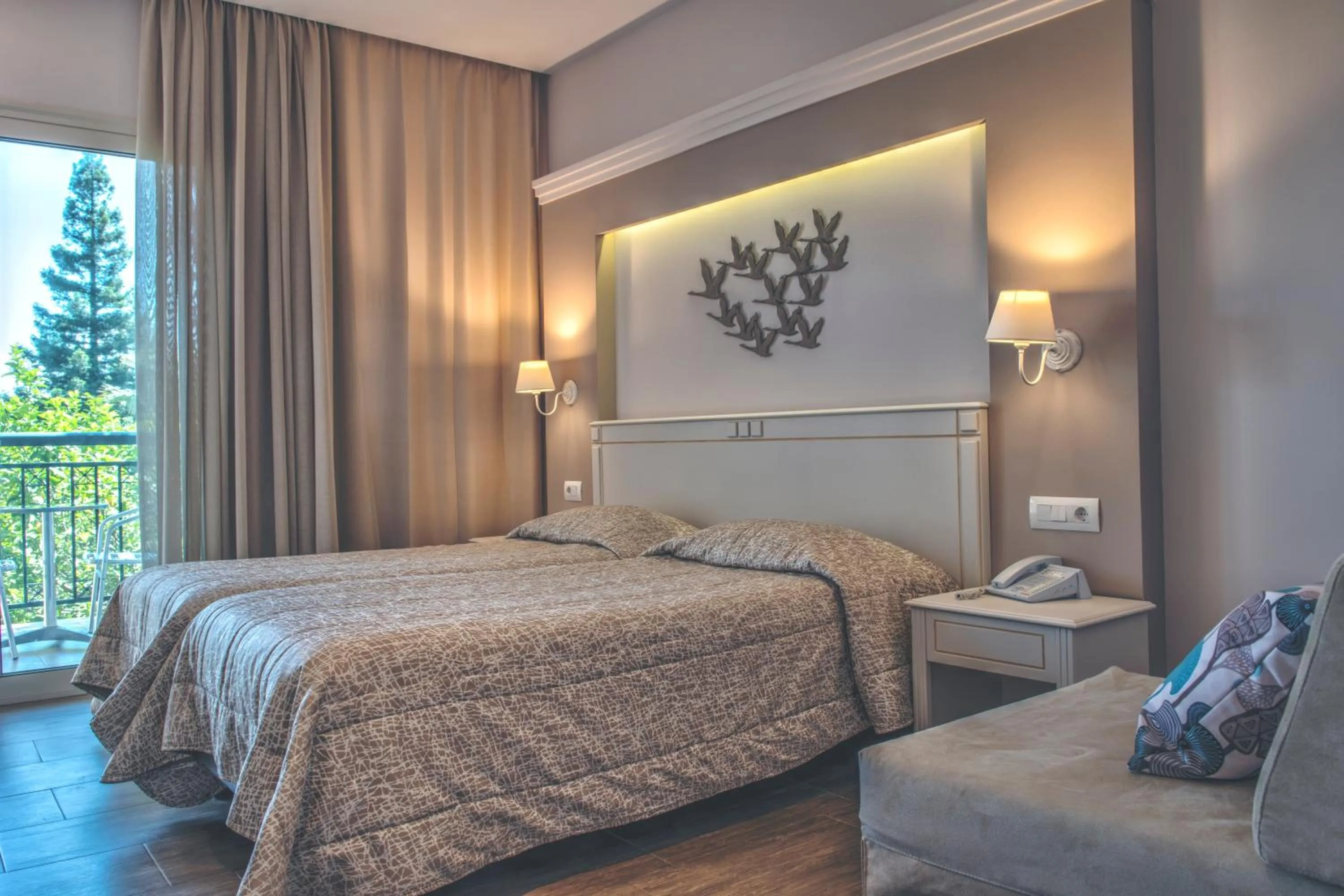 Bed in Delfinia Hotel