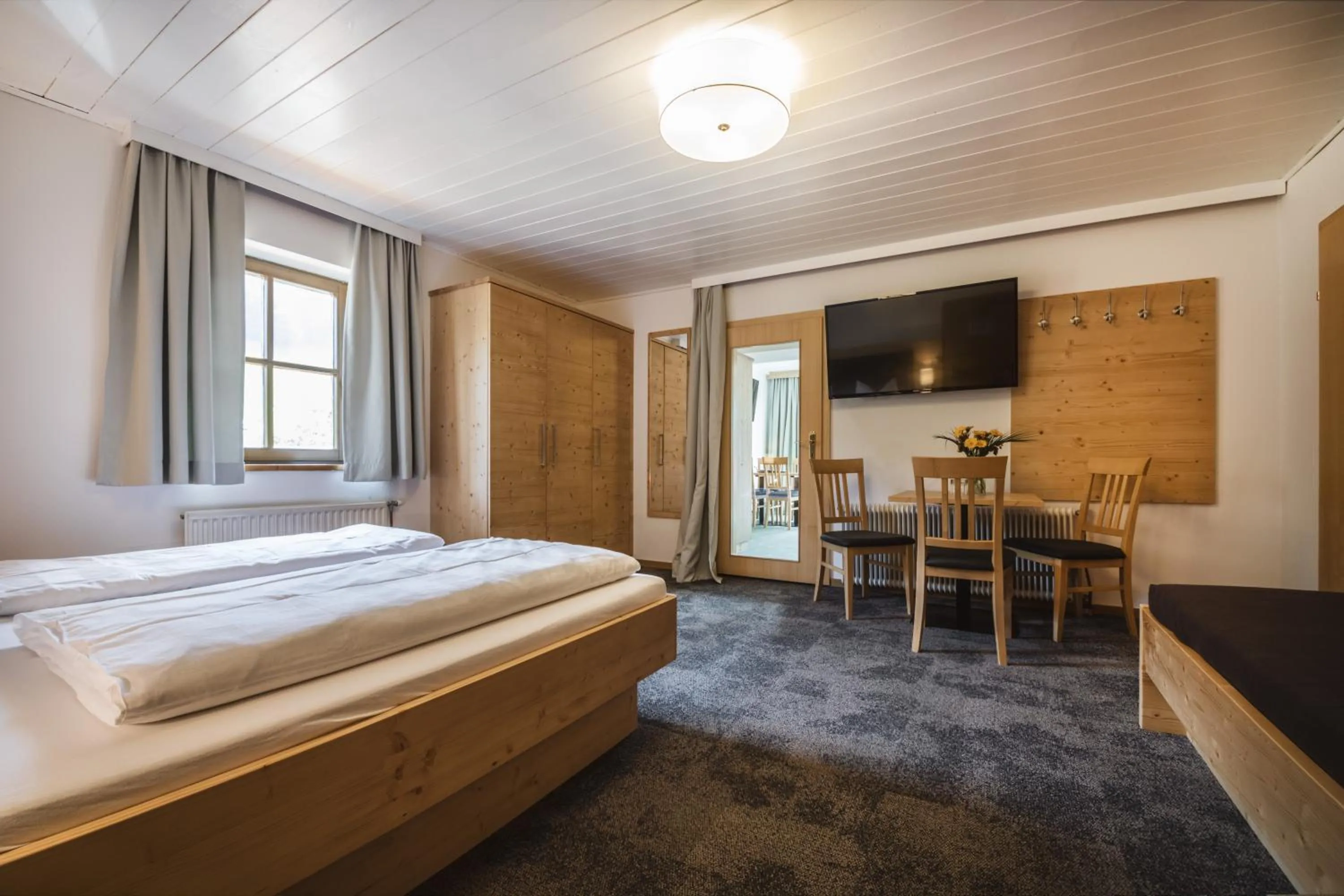 Photo of the whole room, Bed in Familienhotel Botenwirt