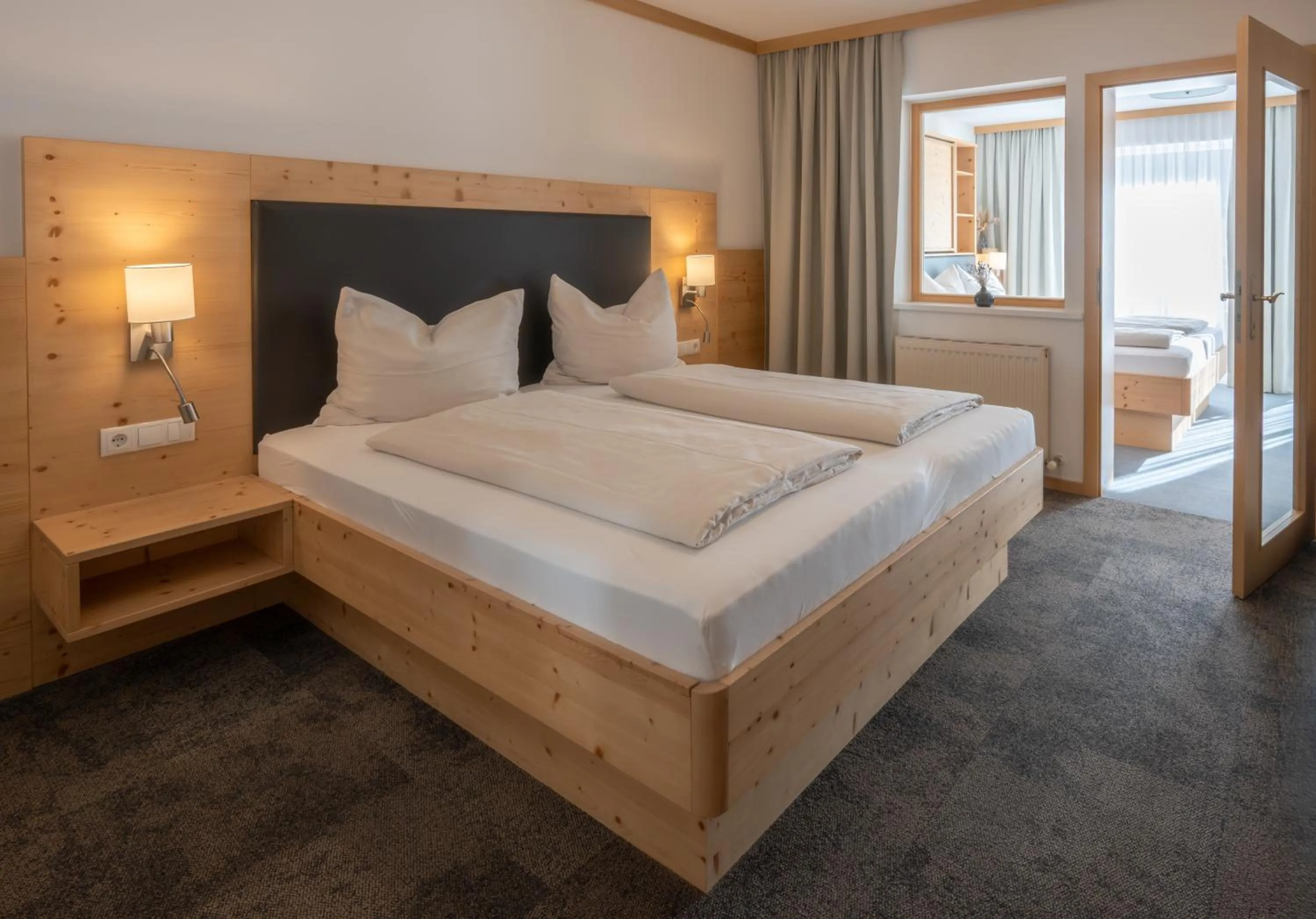 Photo of the whole room, Bed in Familienhotel Botenwirt