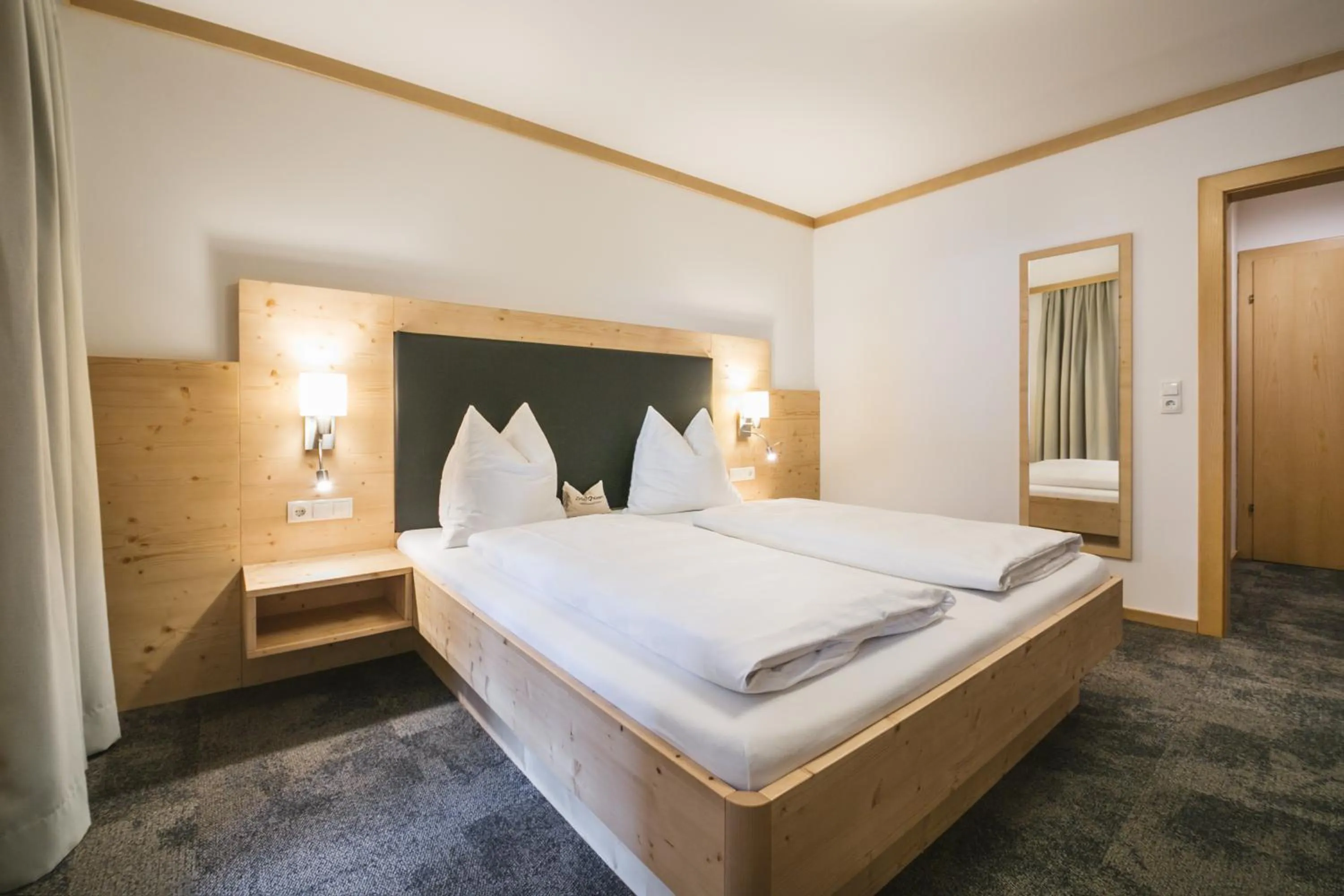 Bed in Familienhotel Botenwirt