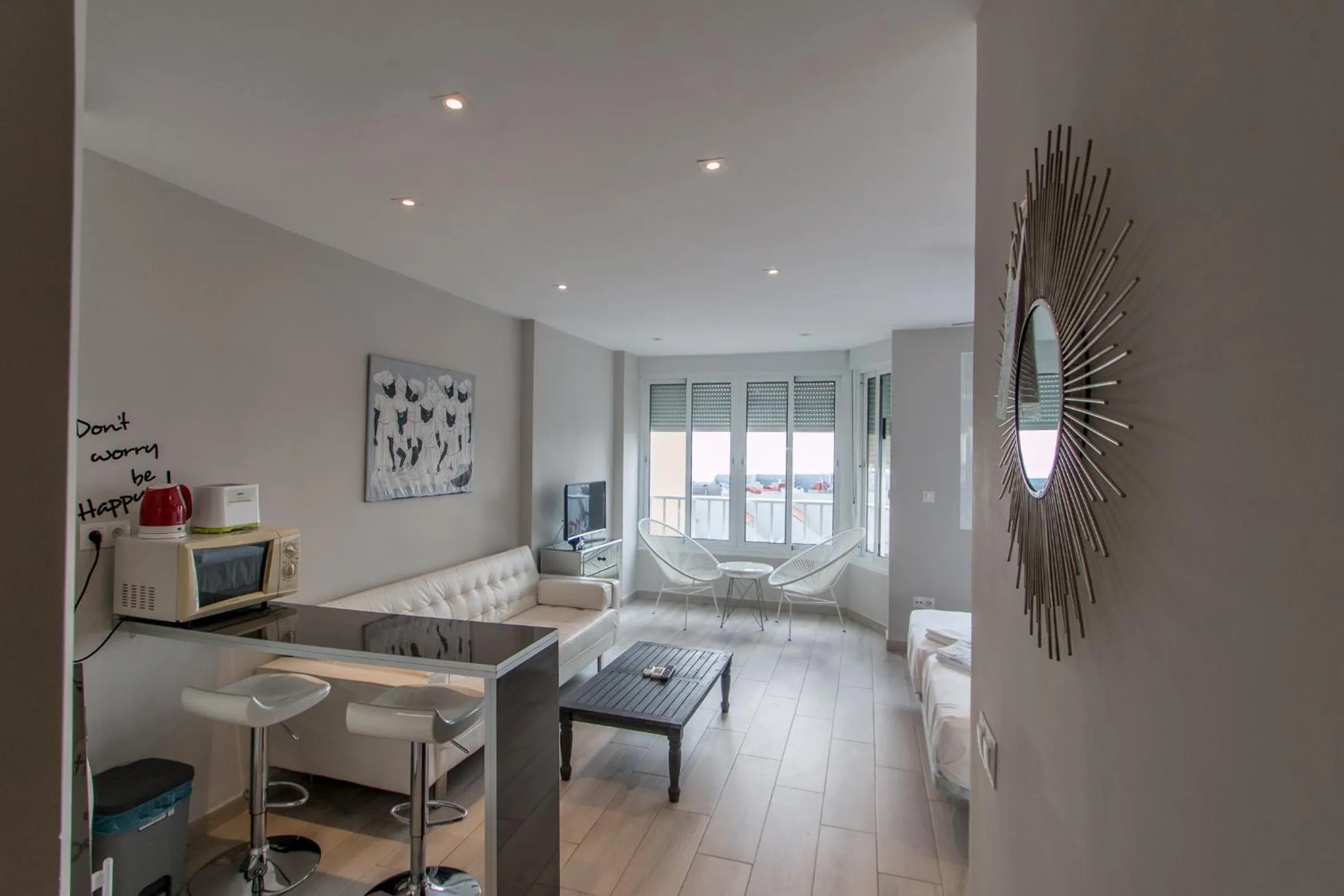 Living room, Bed in Palm Beach Club Apartamentos Carihuela