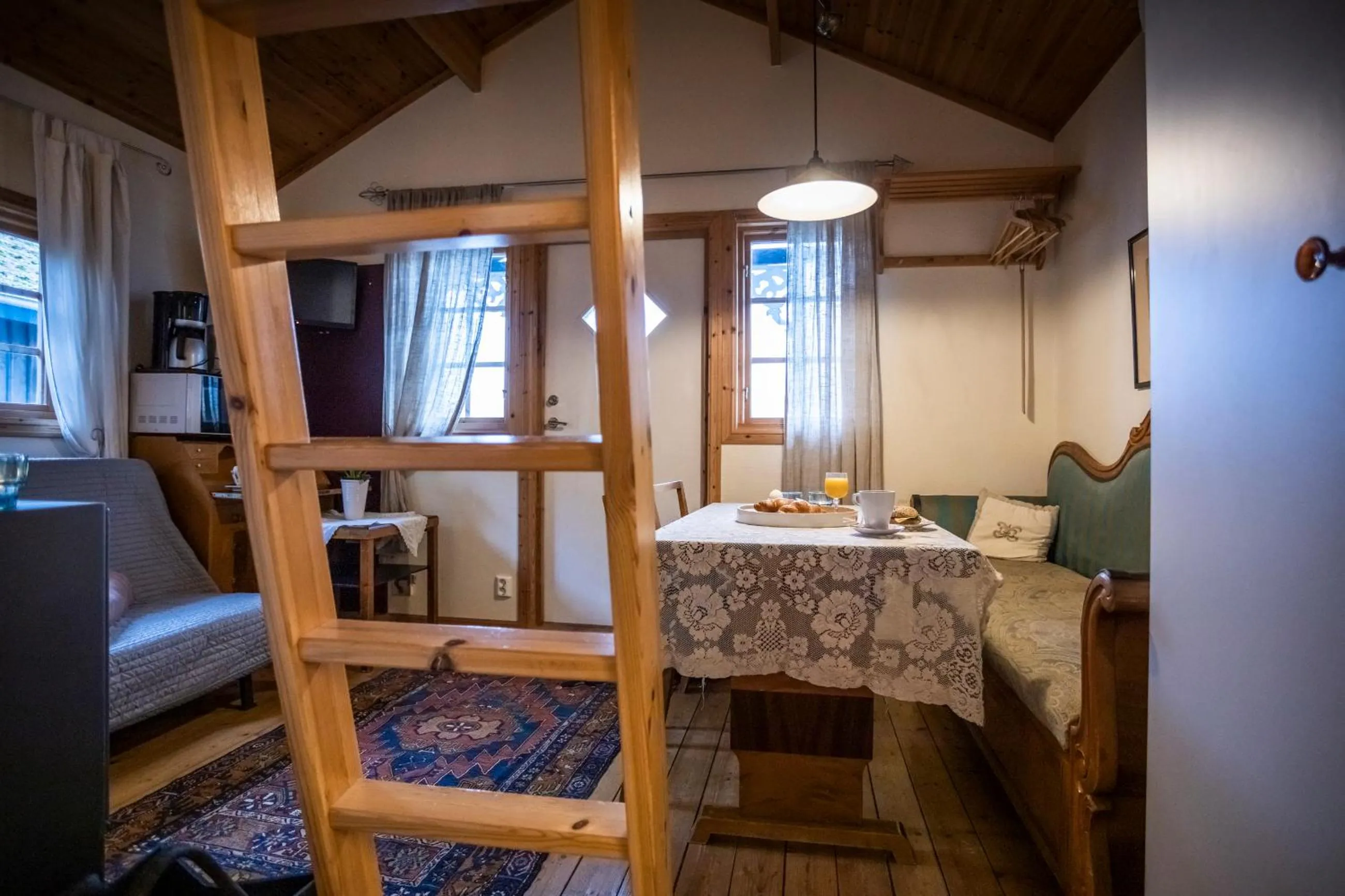 Living room, Bed in Skotteksgården Cottages