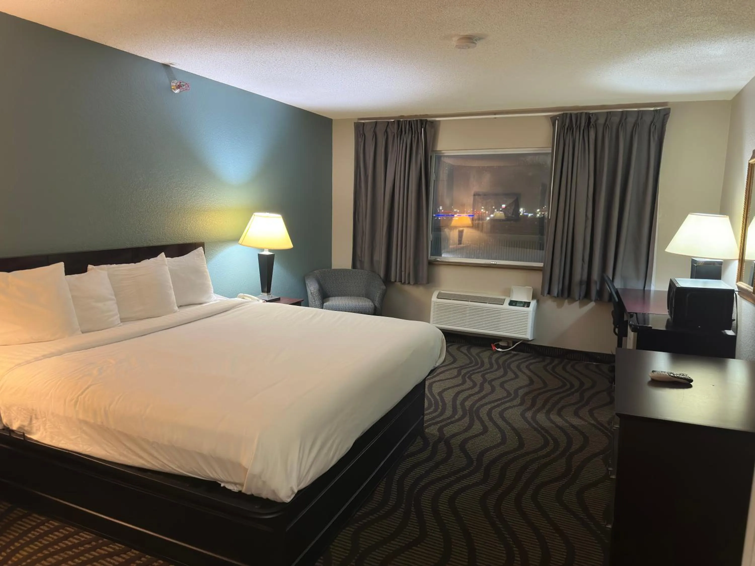 Bed in Baymont Inn & Suites by Wyndham Lincoln NE