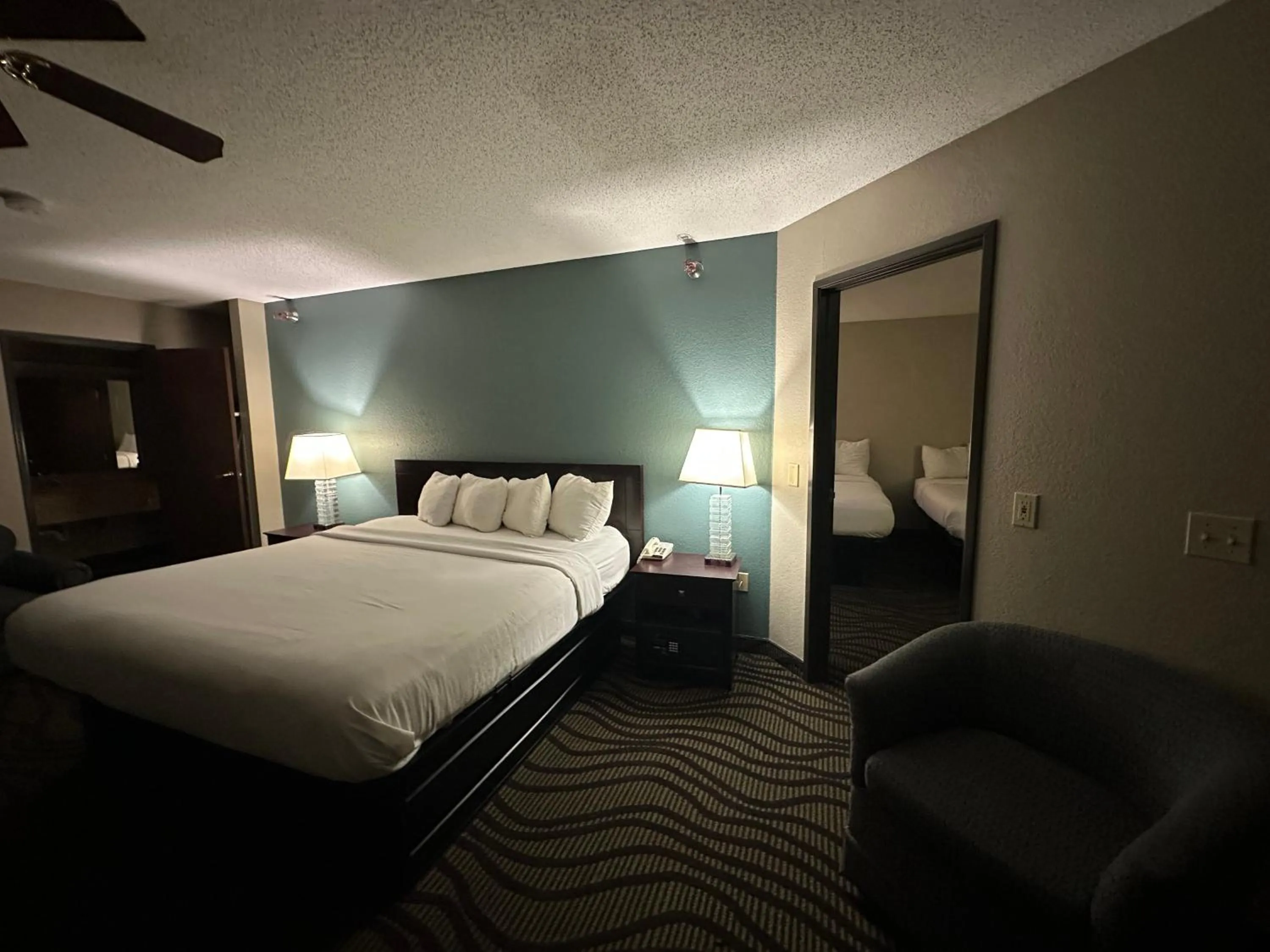 Bed in Baymont Inn & Suites by Wyndham Lincoln NE