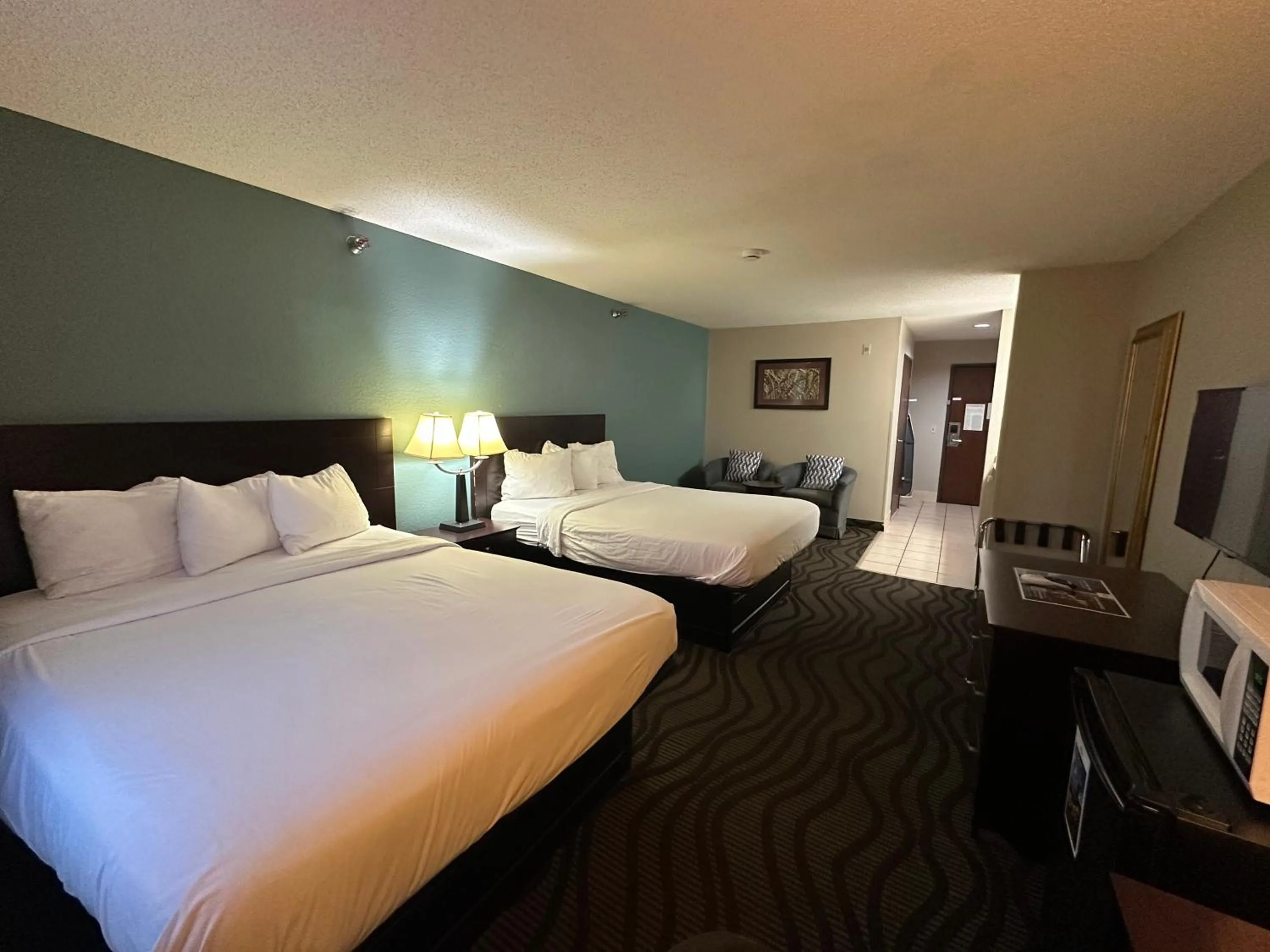 Bed in Baymont Inn & Suites by Wyndham Lincoln NE