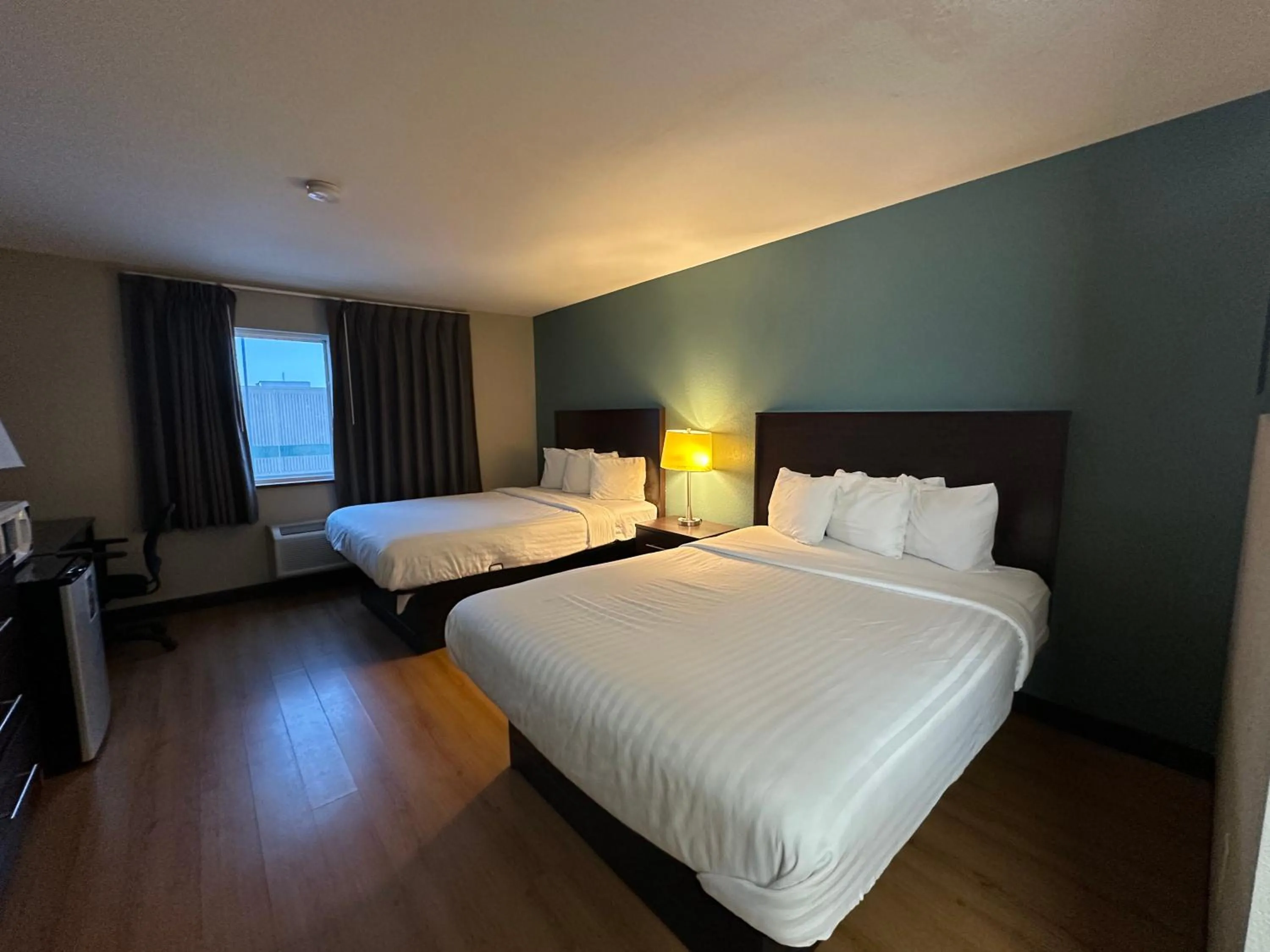 Bed in Baymont Inn & Suites by Wyndham Lincoln NE