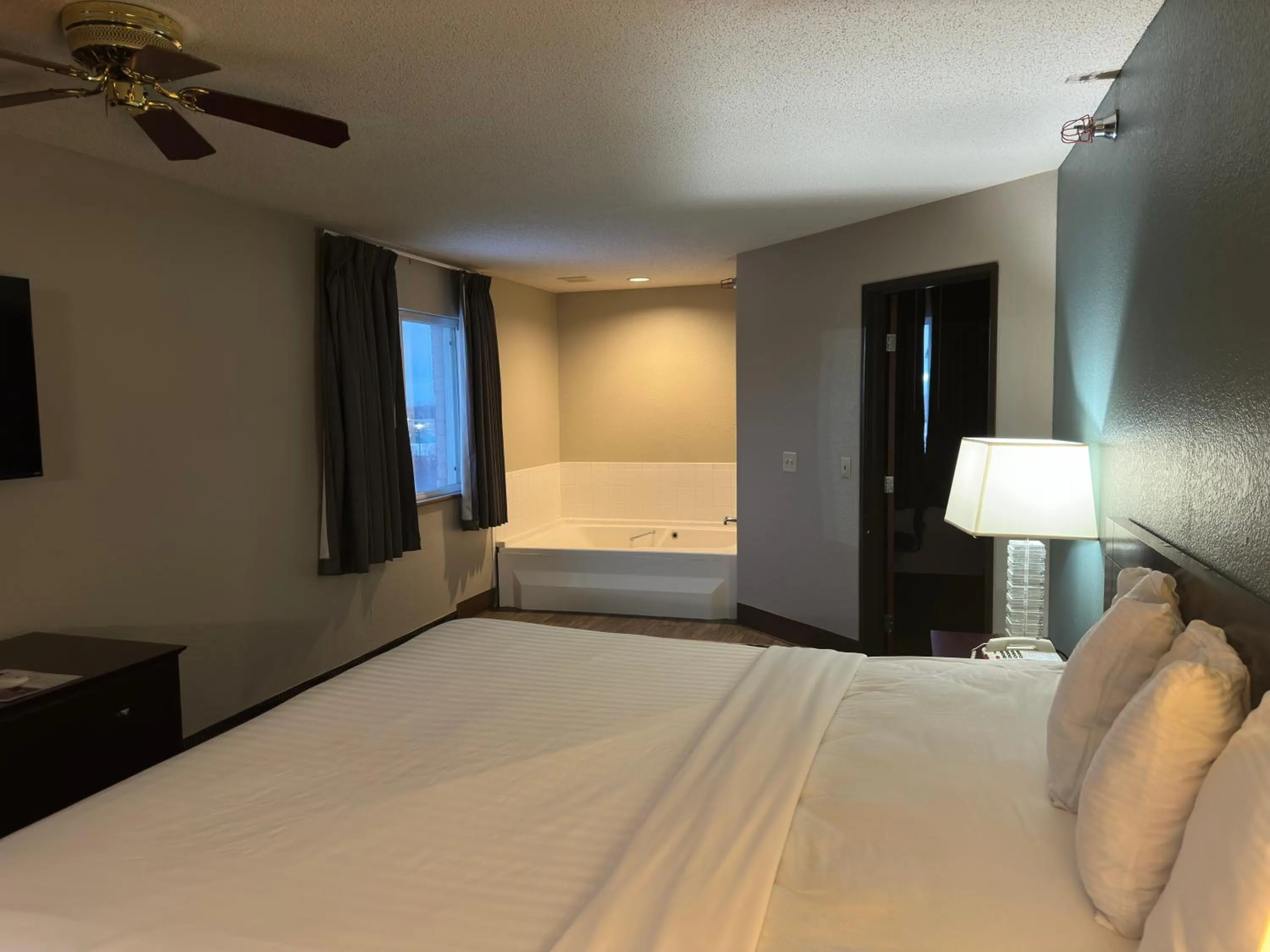 Bed in Baymont Inn & Suites by Wyndham Lincoln NE
