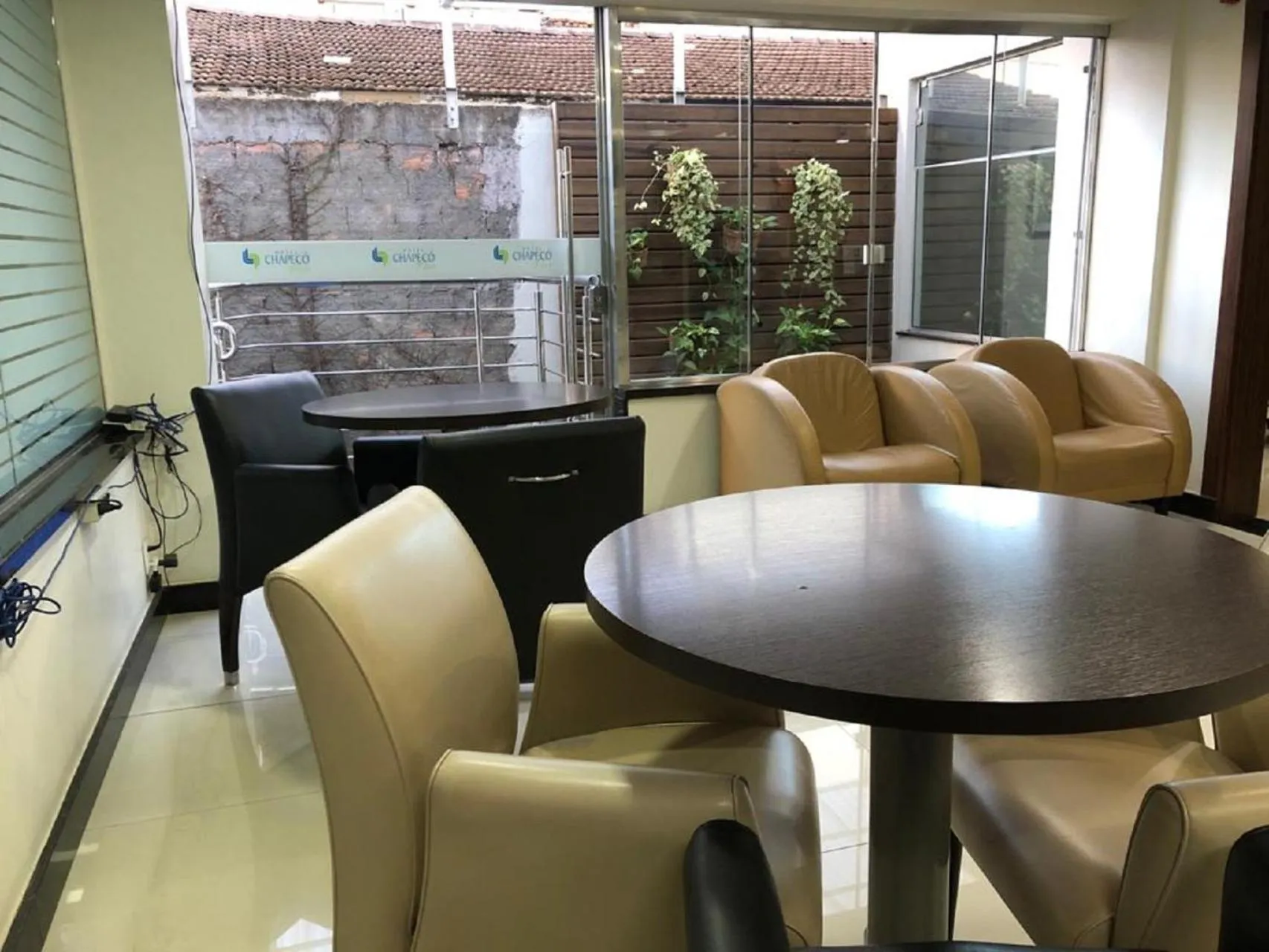 Communal lounge/ TV room in Tri Hotel Centro Chapecó