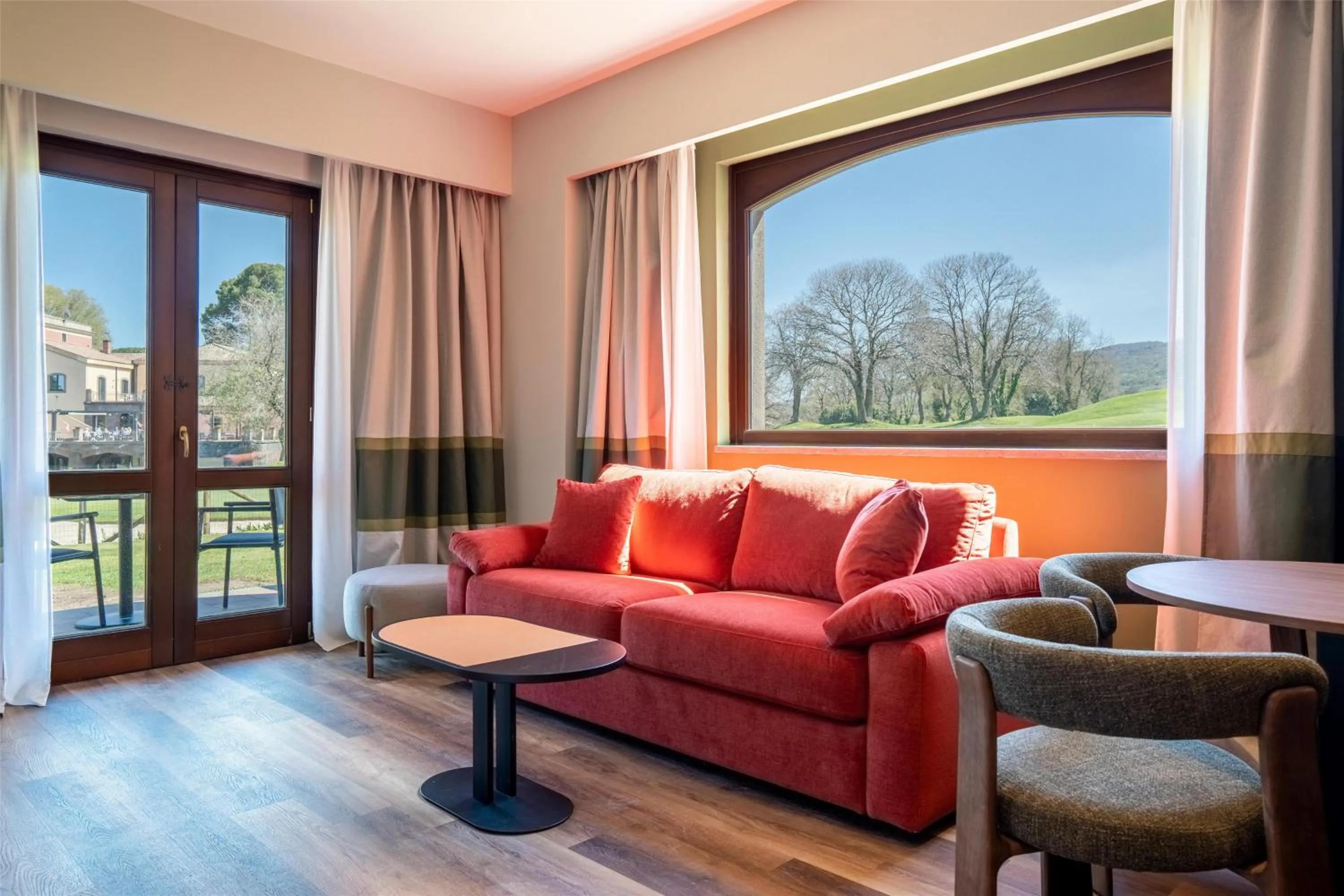 Living room in Picciolo Etna Golf Resort & Spa, Curio Collection by Hilton