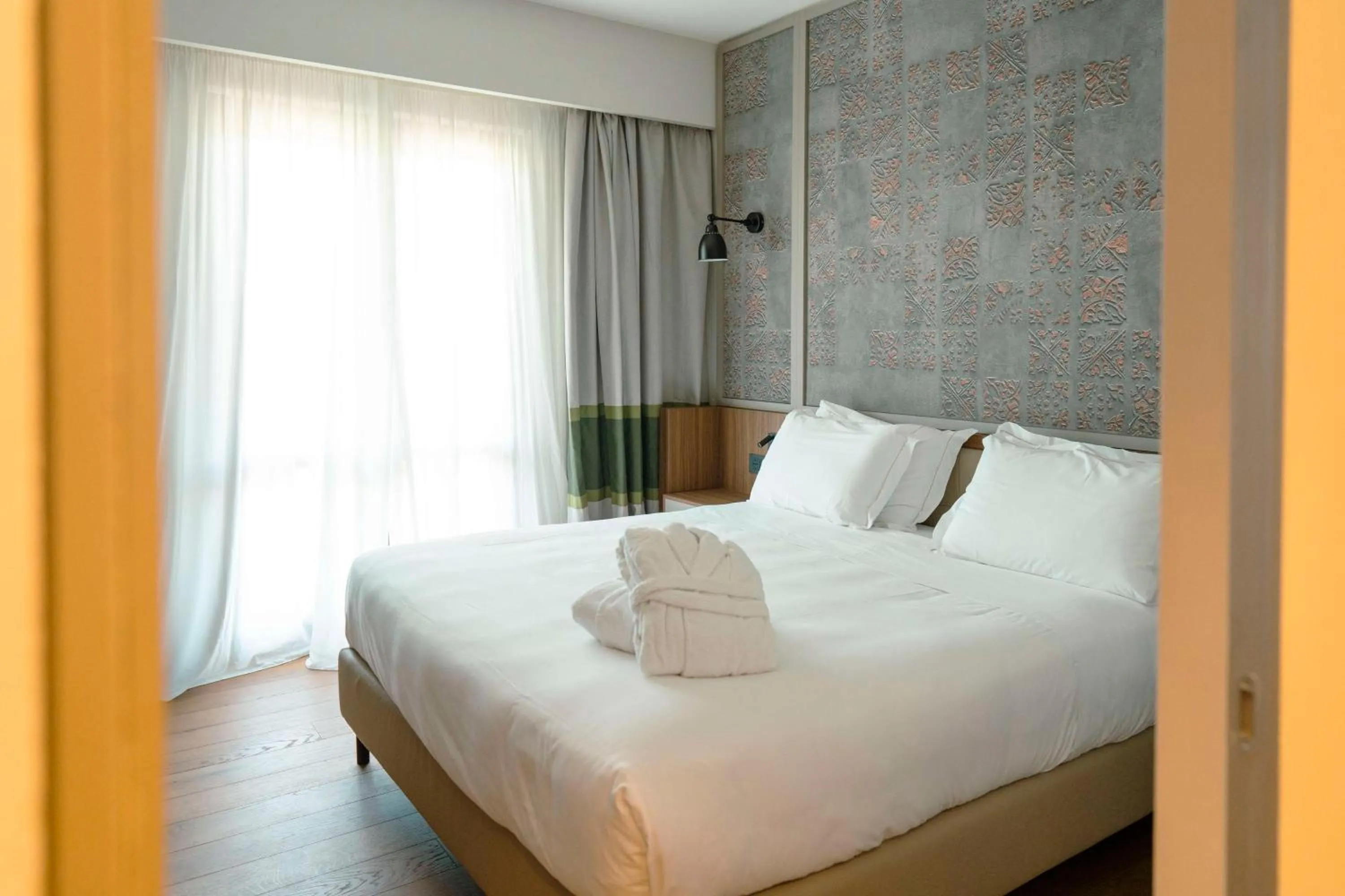 Bed in Picciolo Etna Golf Resort & Spa, Curio Collection by Hilton