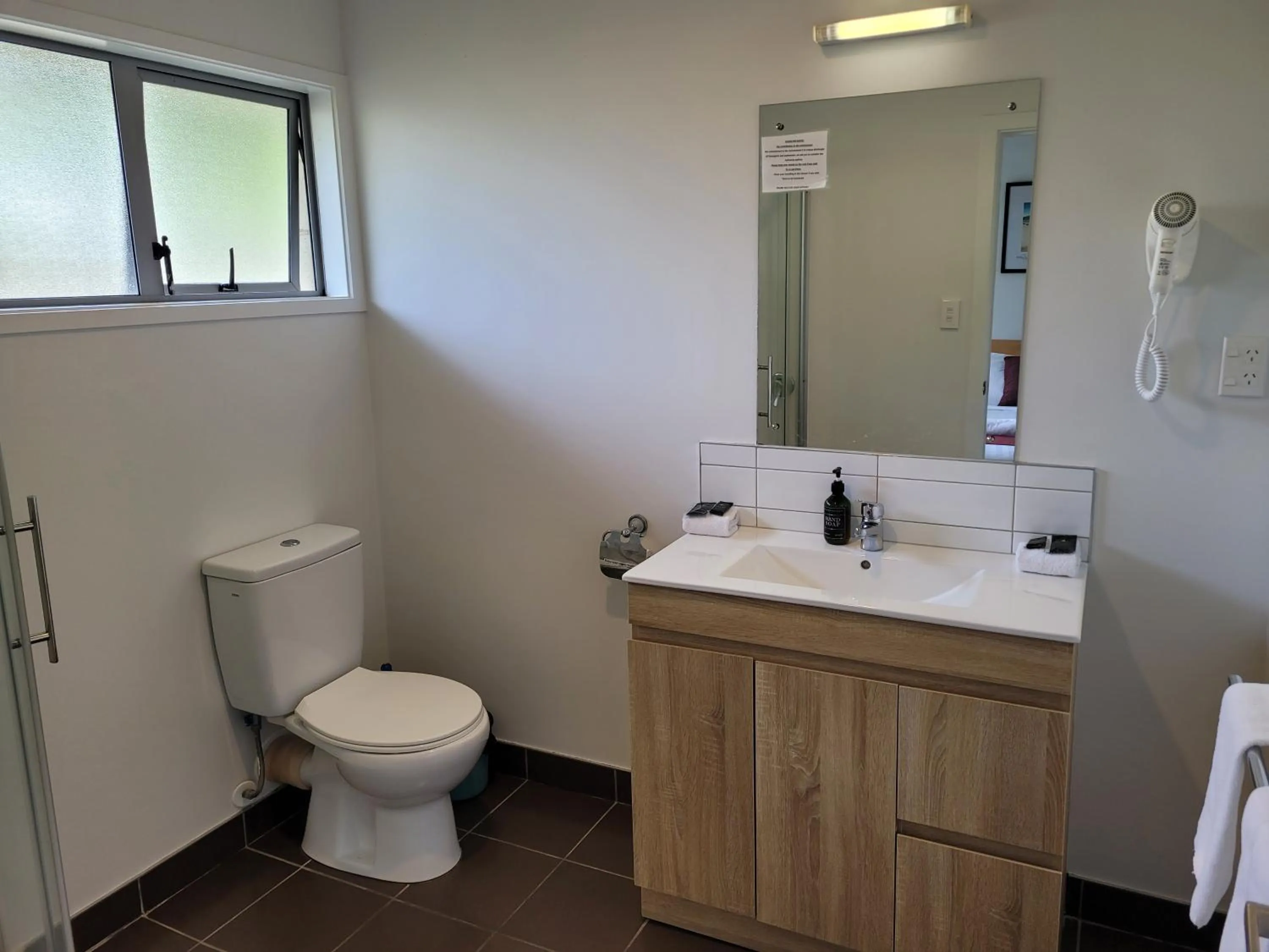 Toilet in Ocean Inn Motel