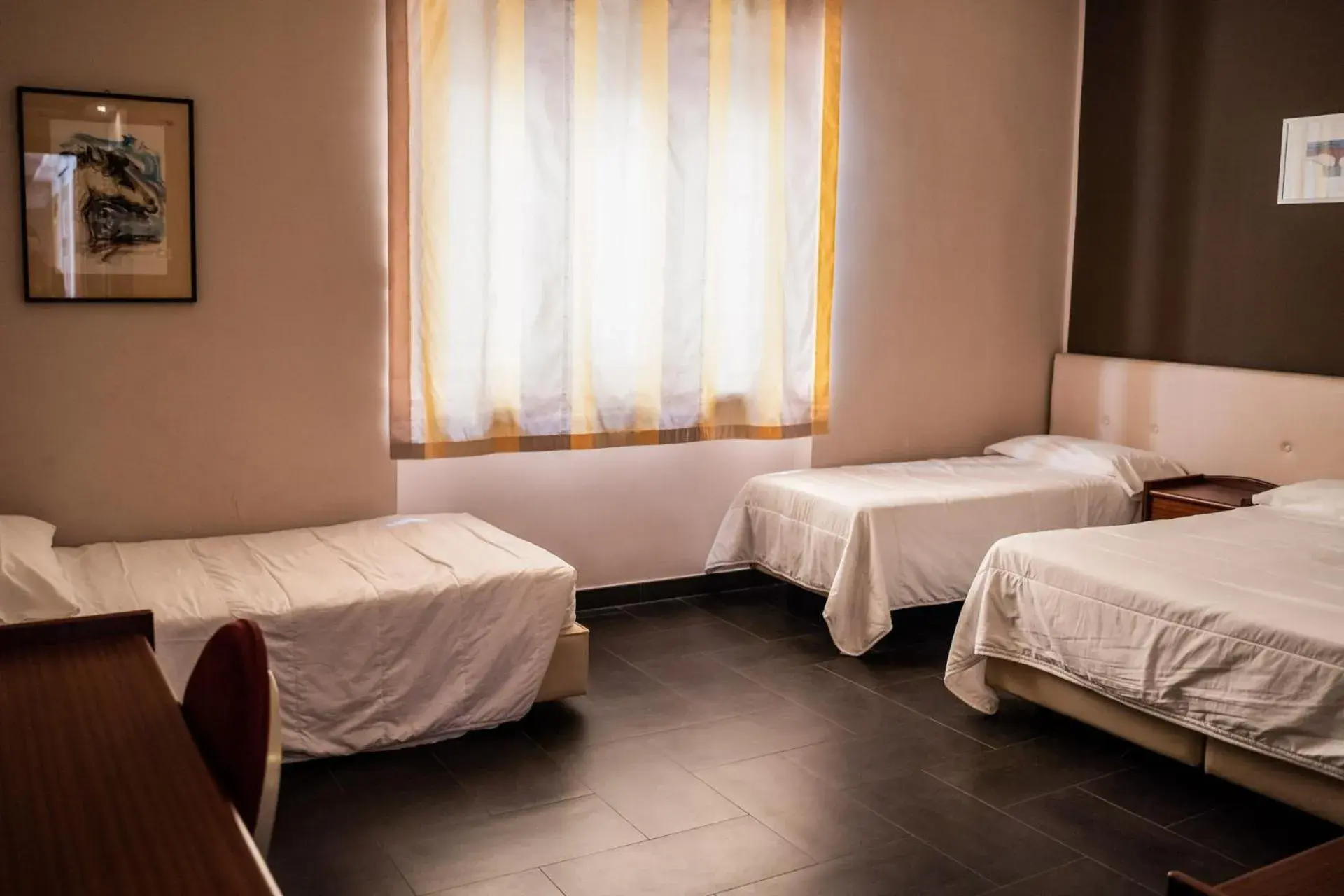 Quadruple Room in Hotel Mediterraneo Quadruple Room in Hotel Mediterraneo