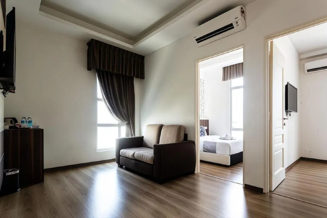 Living room, Bed in THE REED HOTEL MELAKA formerly known as E-Red Hotel Melaka