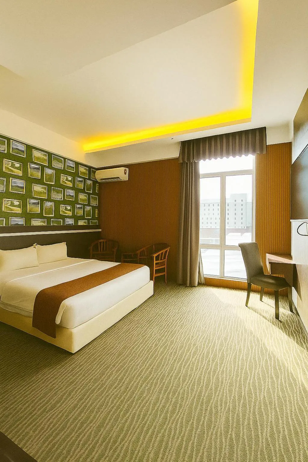 Photo of the whole room, Bed in THE REED HOTEL MELAKA formerly known as E-Red Hotel Melaka