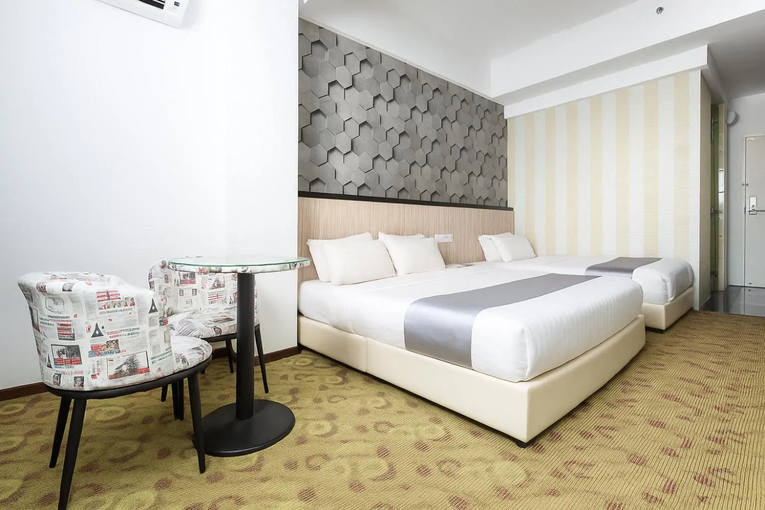 Bed in THE REED HOTEL MELAKA formerly known as E-Red Hotel Melaka