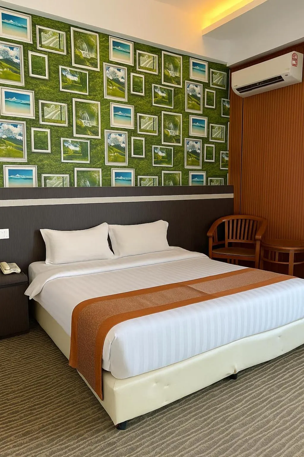 Bed in THE REED HOTEL MELAKA formerly known as E-Red Hotel Melaka