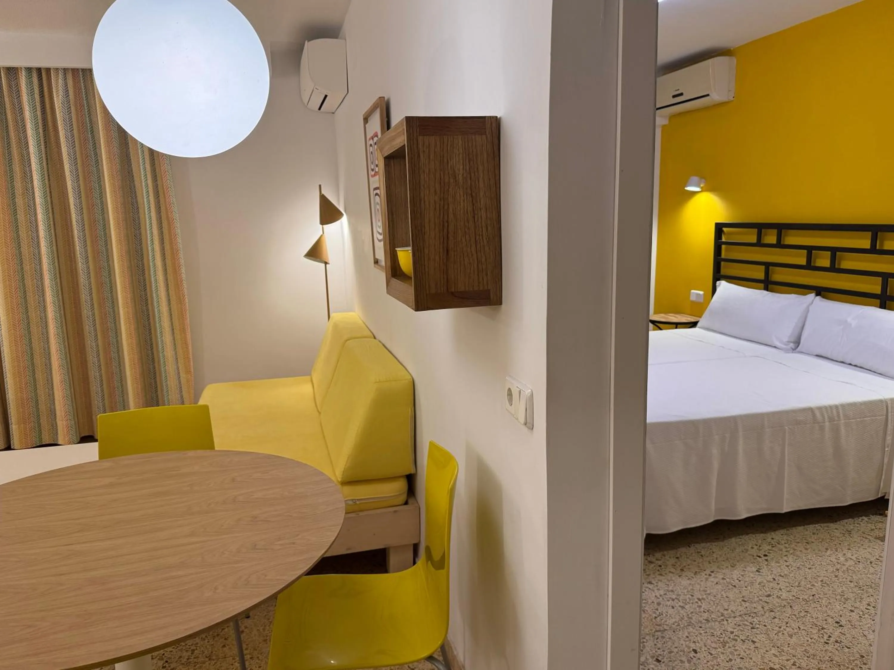 Seating area, Bed in Boutique Apartments Poniente Playa