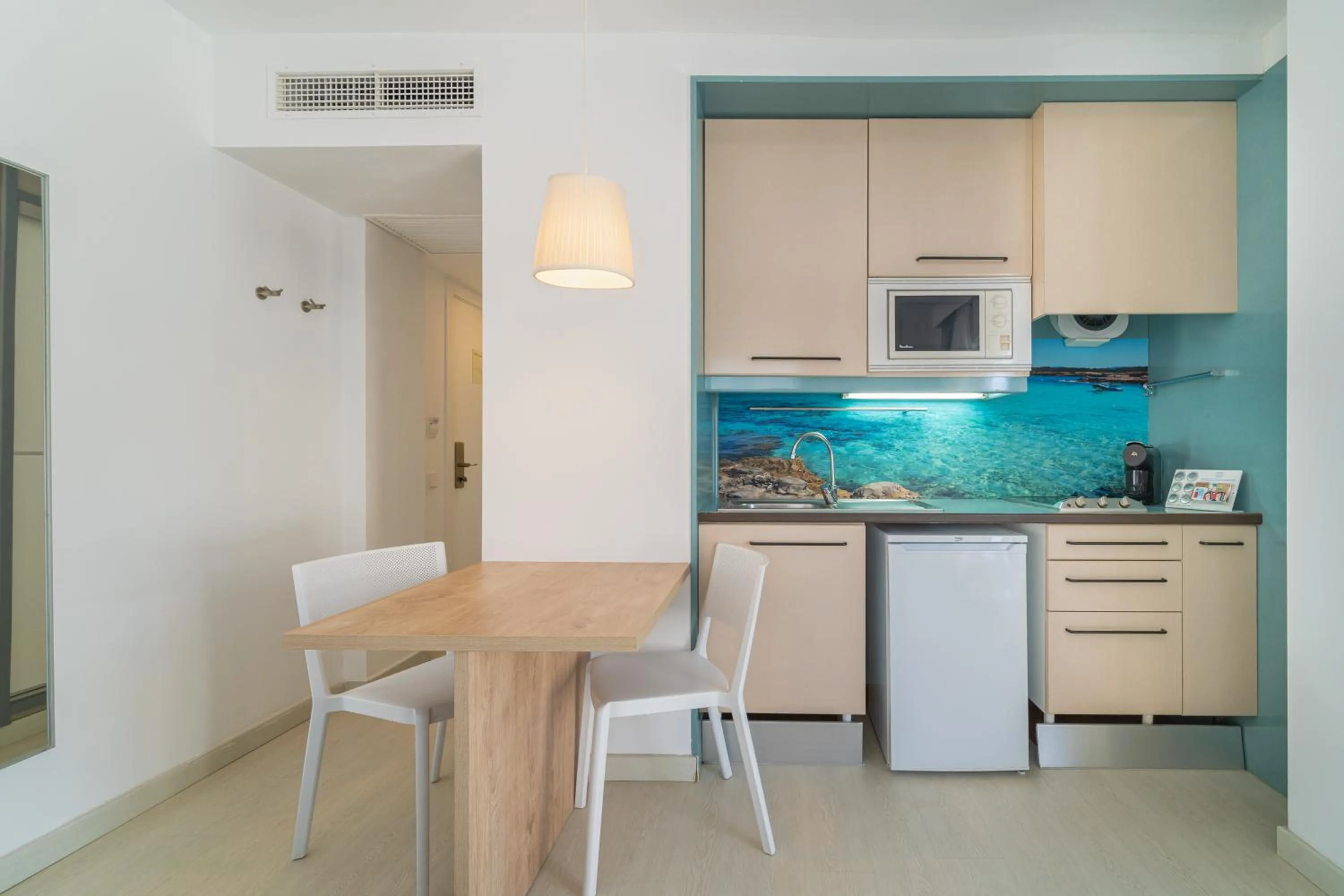 Kitchen or kitchenette in Apartamentos Caprice Tamarindos