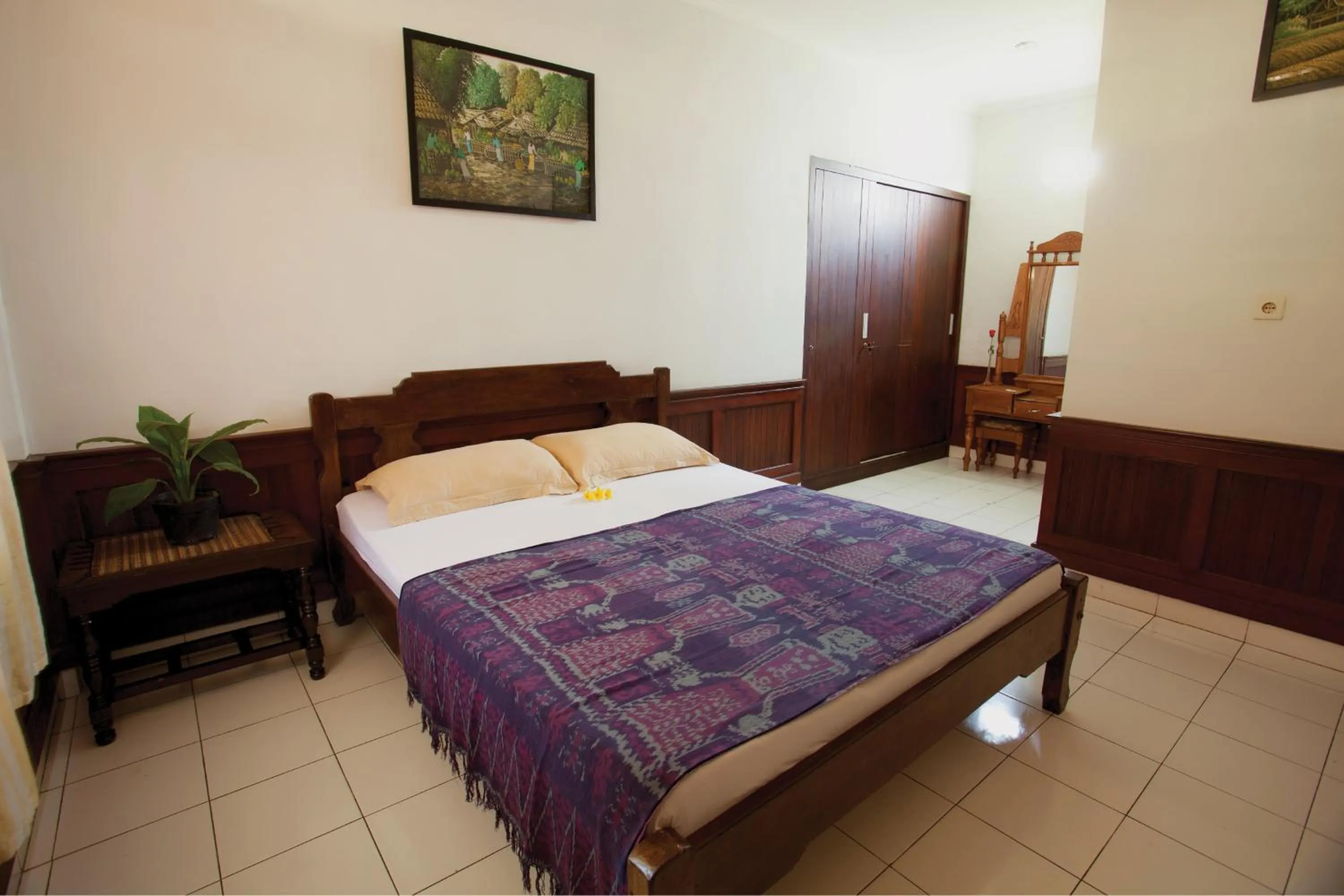 Photo of the whole room, Bed in Sari Indah Cottages