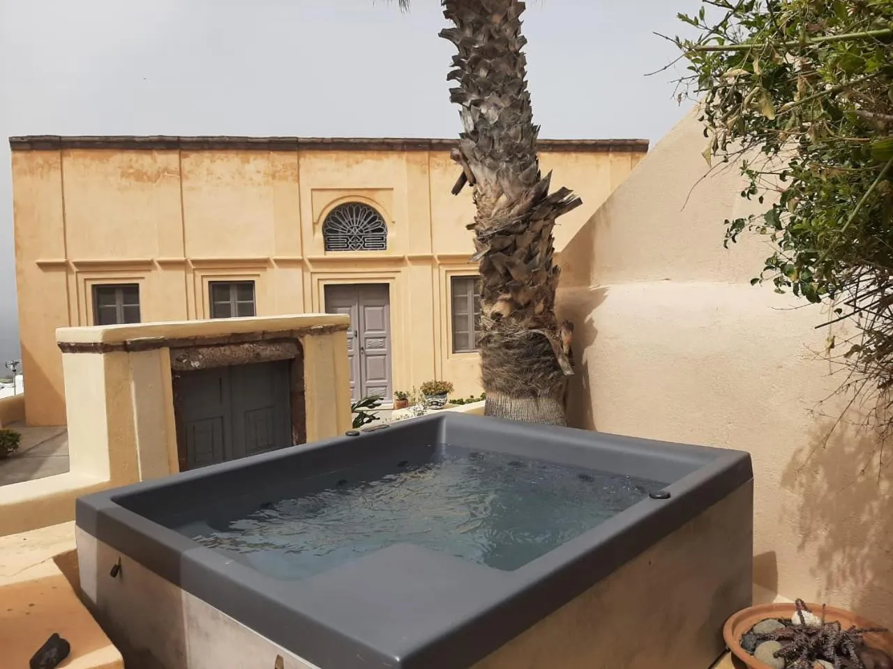 Hot Tub in OIA UNIQUE HOMES by K&K